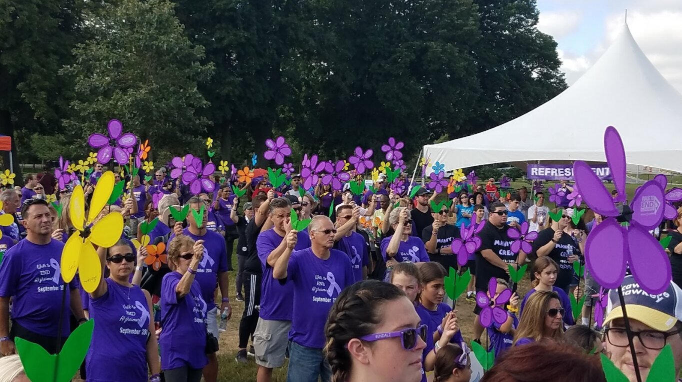 The annual 'Walk to End Alzheimer's' is returning to Eisenhower Park on Oct. 1. During the ceremony, people hold flowers to represent why they walk, which is uplifting for the families affected by Alzheimer's disease.