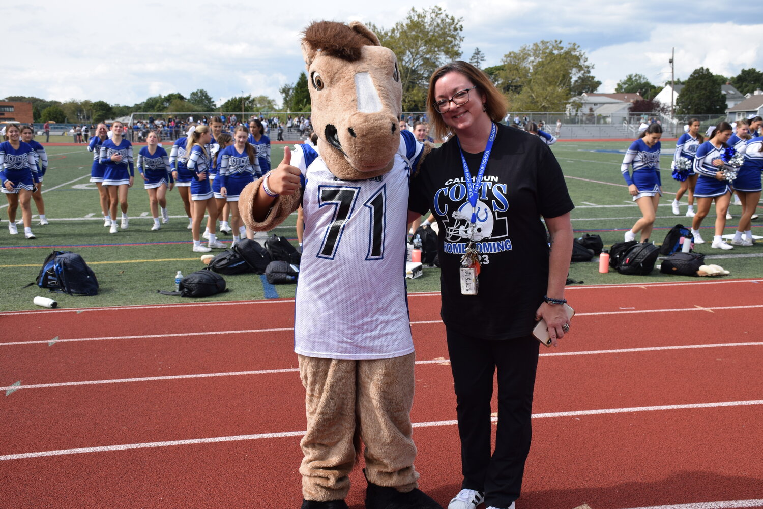 Charlie the Colt, also known as Jordan Ovalle, the school’s mascot, with Principal Nicole Hollings.