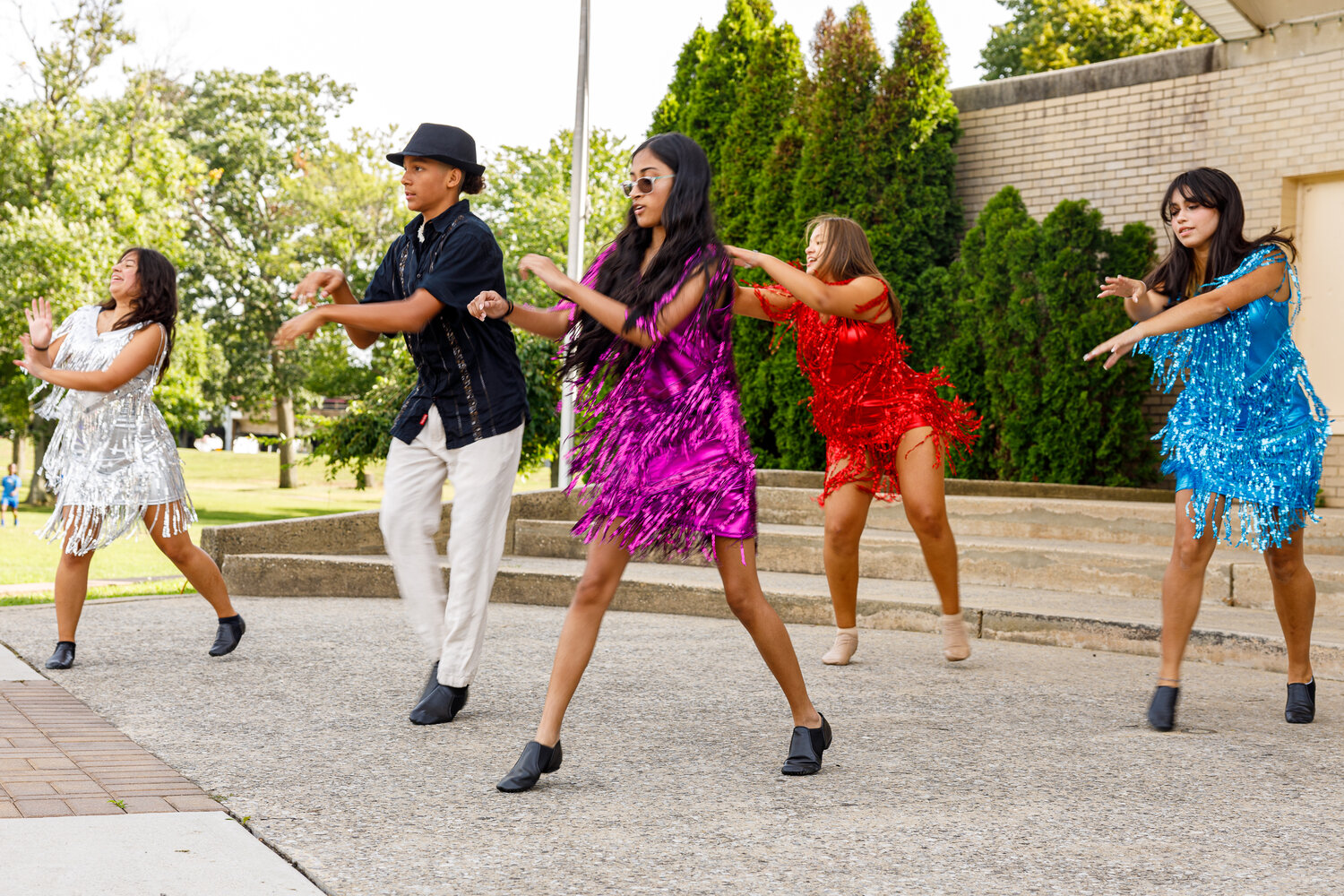 Los Salseros dancers from Central Memorial PTSA rouse the crowd at the Valley Stream Hispanic Heritage Month celebration on Sept. 16. Above, Amelia Bharry, 16, Wayne Wingson, 13, Melissa Beharry, 16, Olivia Martinez, 14, and Kayleen Wingson, 16.