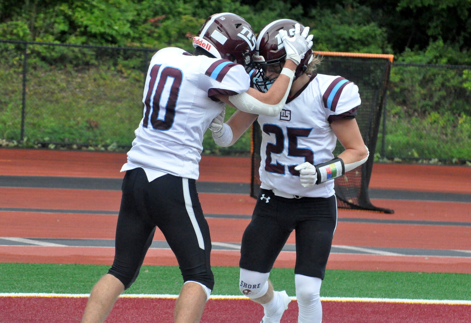 North Shore's Gianlucca Sferrazza, right, and John Haff celebrated the first of Sferrazza's three touchdowns in Saturday's win over East Rockaway.