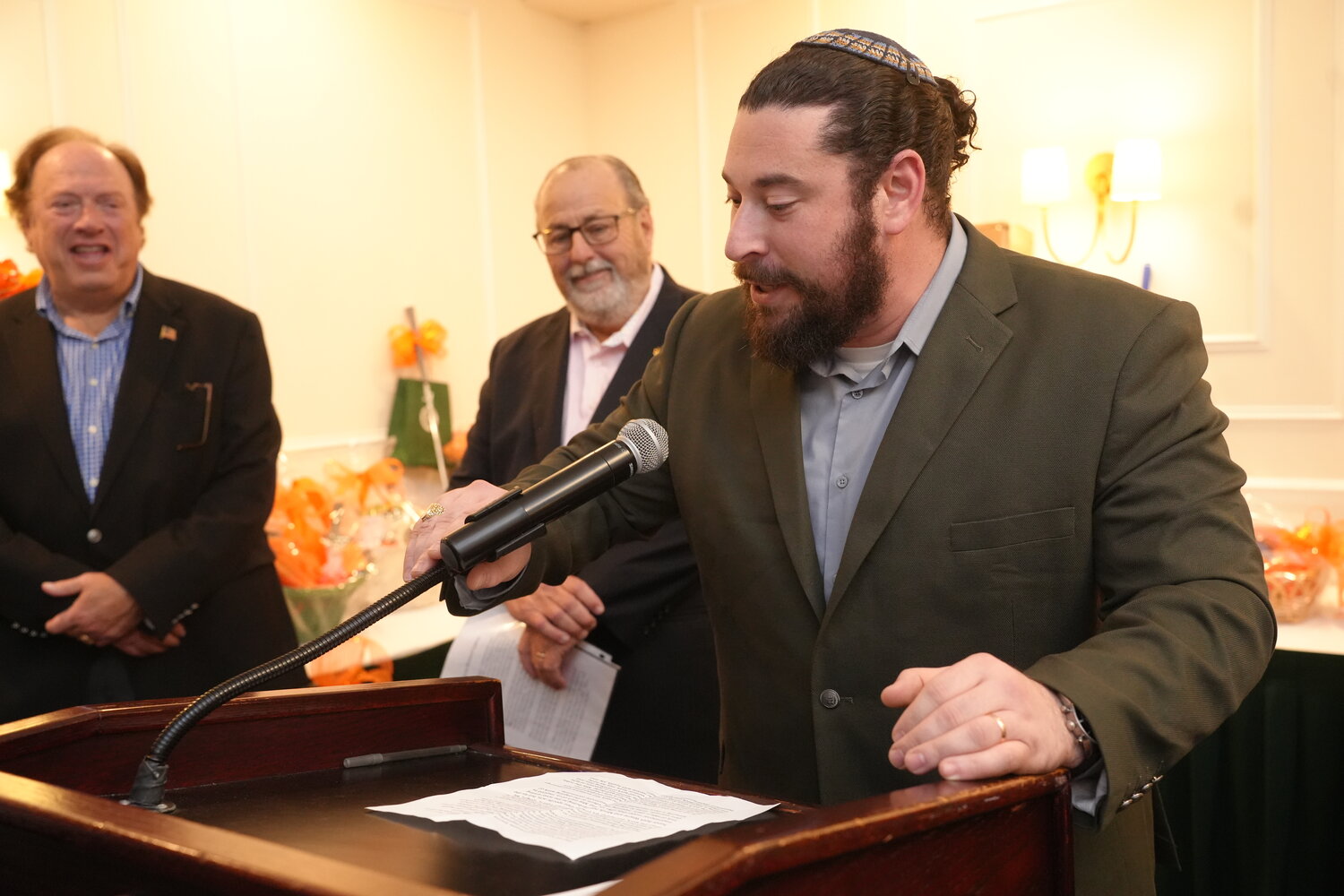 Rabbi Michael Cohen of Central Synagogue-Beth Emeth delivers an invocation during the dinner presentation.