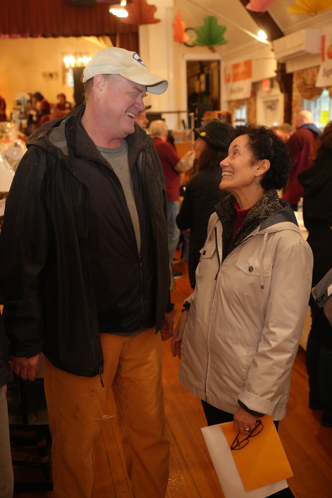 Karl Pupke shops for Christmas gifts at the fair with Steering committee chair Judi Broadhurst, who helped organize this year’s Friendship Fair.
