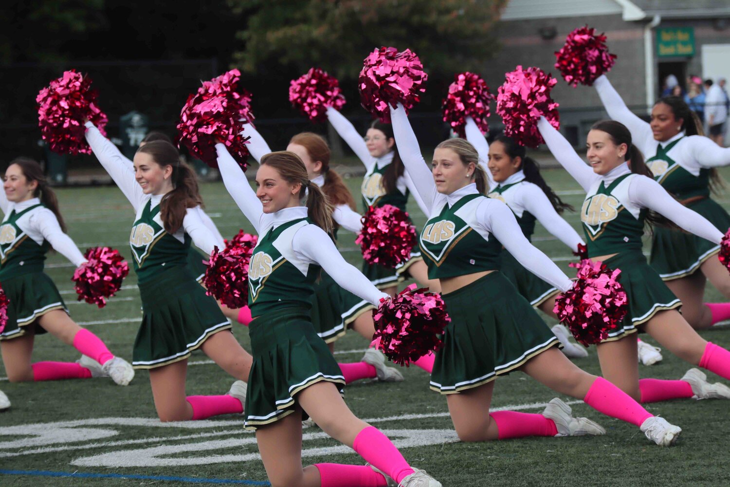 The varsity cheerleaders worked hard especially during their halftime performance.