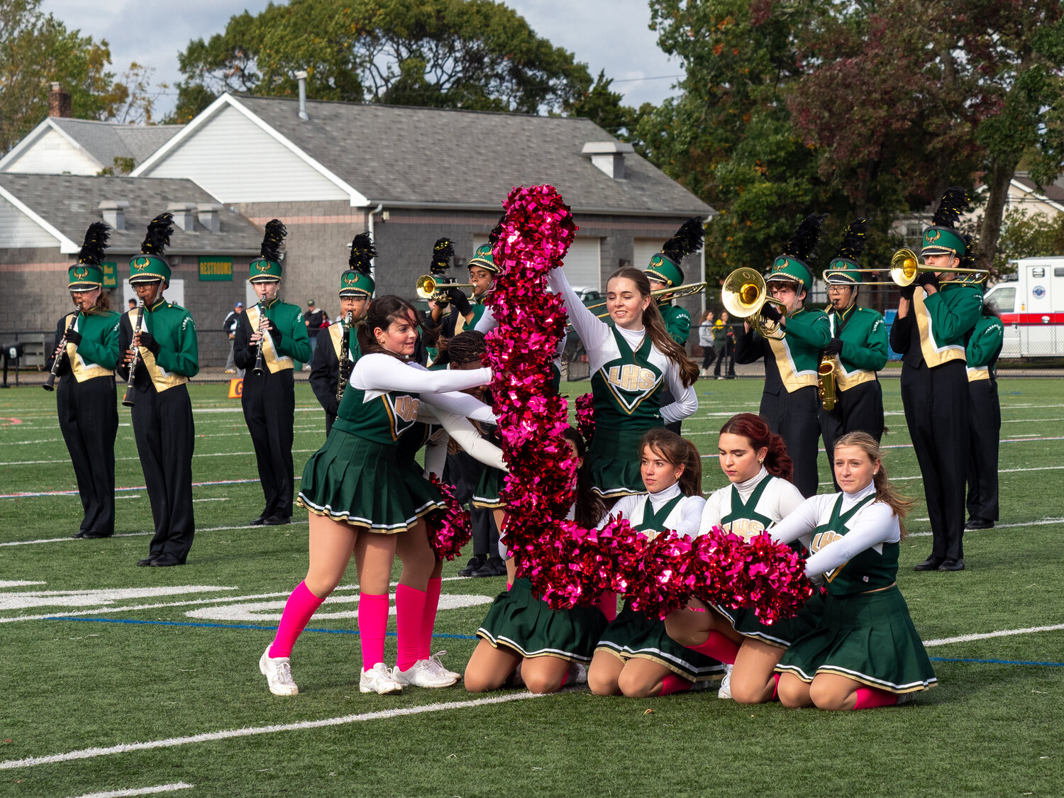 Cheerleaders created a large ‘L’ for Lynbrook while the marching band performed during halftime.