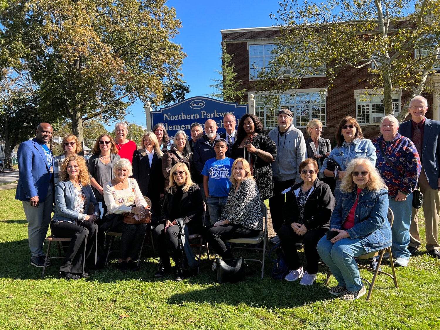 A crowd of enthusiastic Northern Parkway School alumni converged on the school lawn with Principal Bilal Polson for the school’s 100th anniversary.