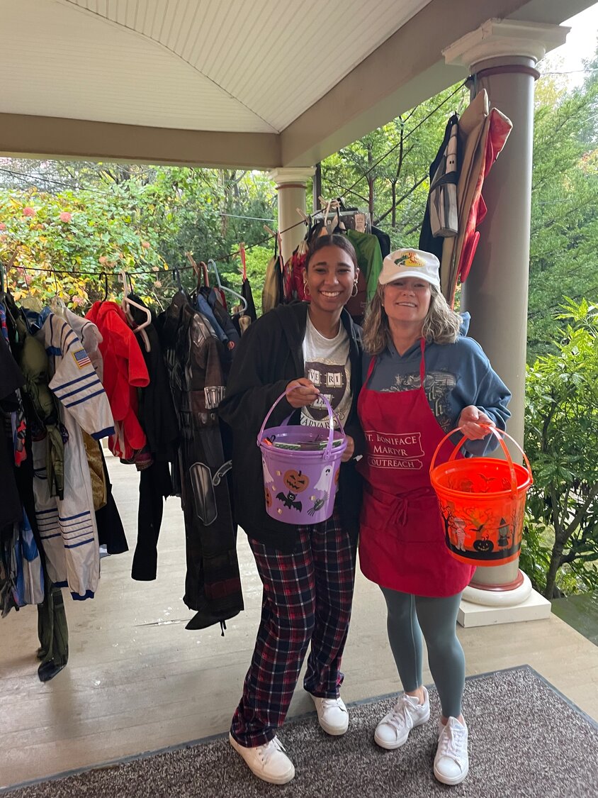 Dozens of parents and children have collected costumes thanks to the work of Love Your Neighbor Project and Jody Fleischmann, right, of St. Boniface Martyr Catholic Church’s Outreach Pantry and Thrift Shop.