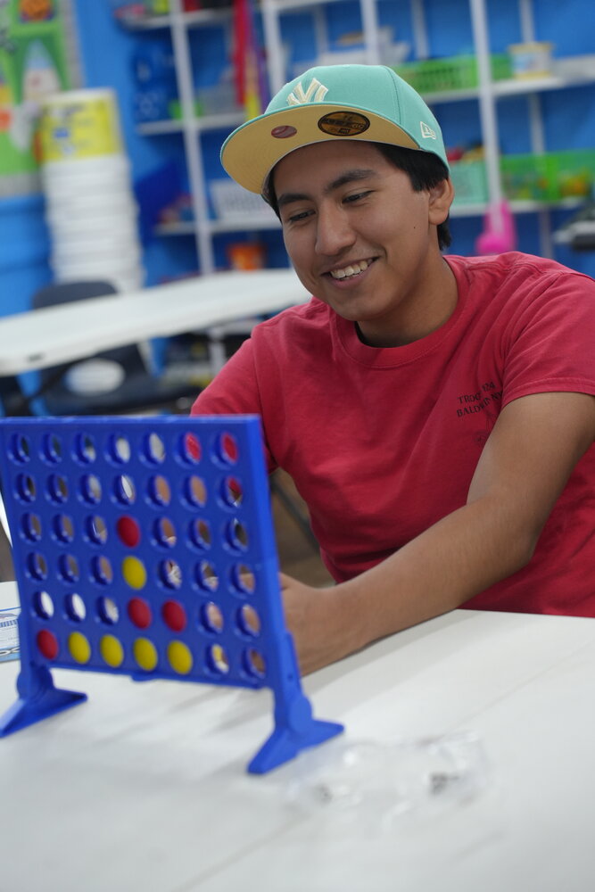 Justin Villarruel from Troop 824 playing Connect 4.