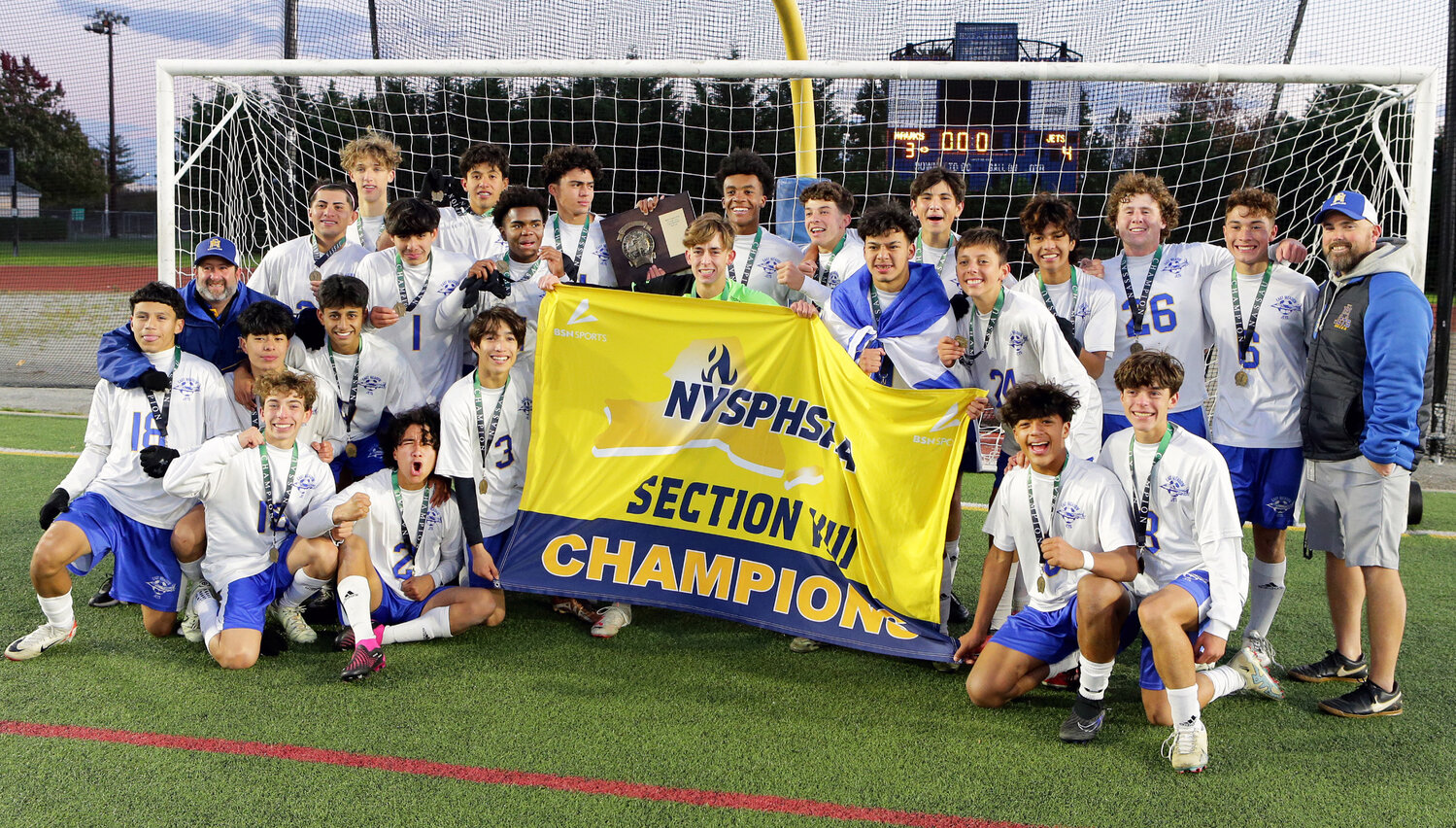 East Meadow boys' soccer celebrated its first-ever Nassau County title Wednesday after defeating Plainview 4-3 in the Class AAA final.