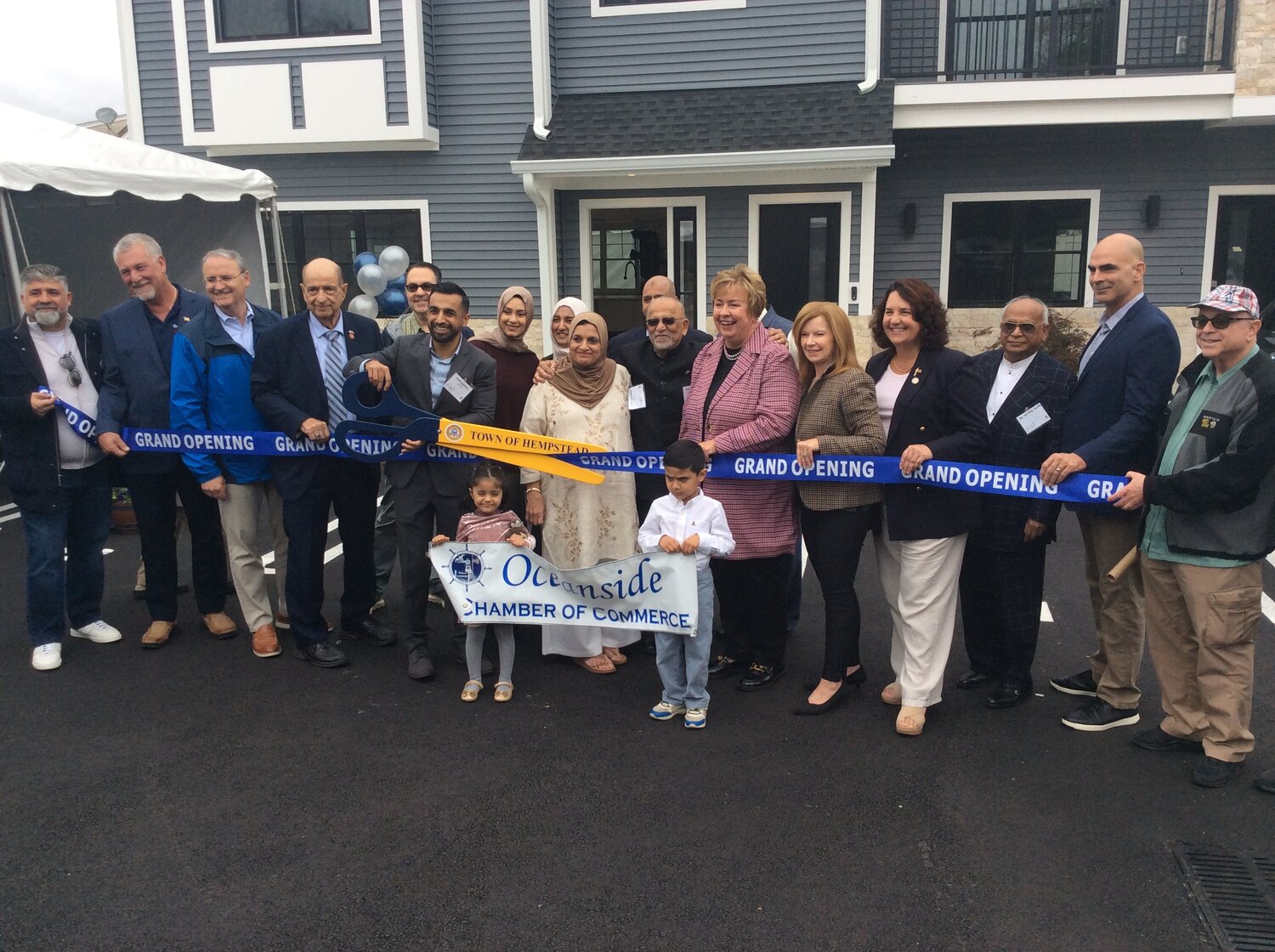 Community members and town officals came to celebrate the completion of the local private apartment complex on 418 Atlantic Avenue, the Inlet, financed by Oceanside residents Usman and Ubaid Bandukra.