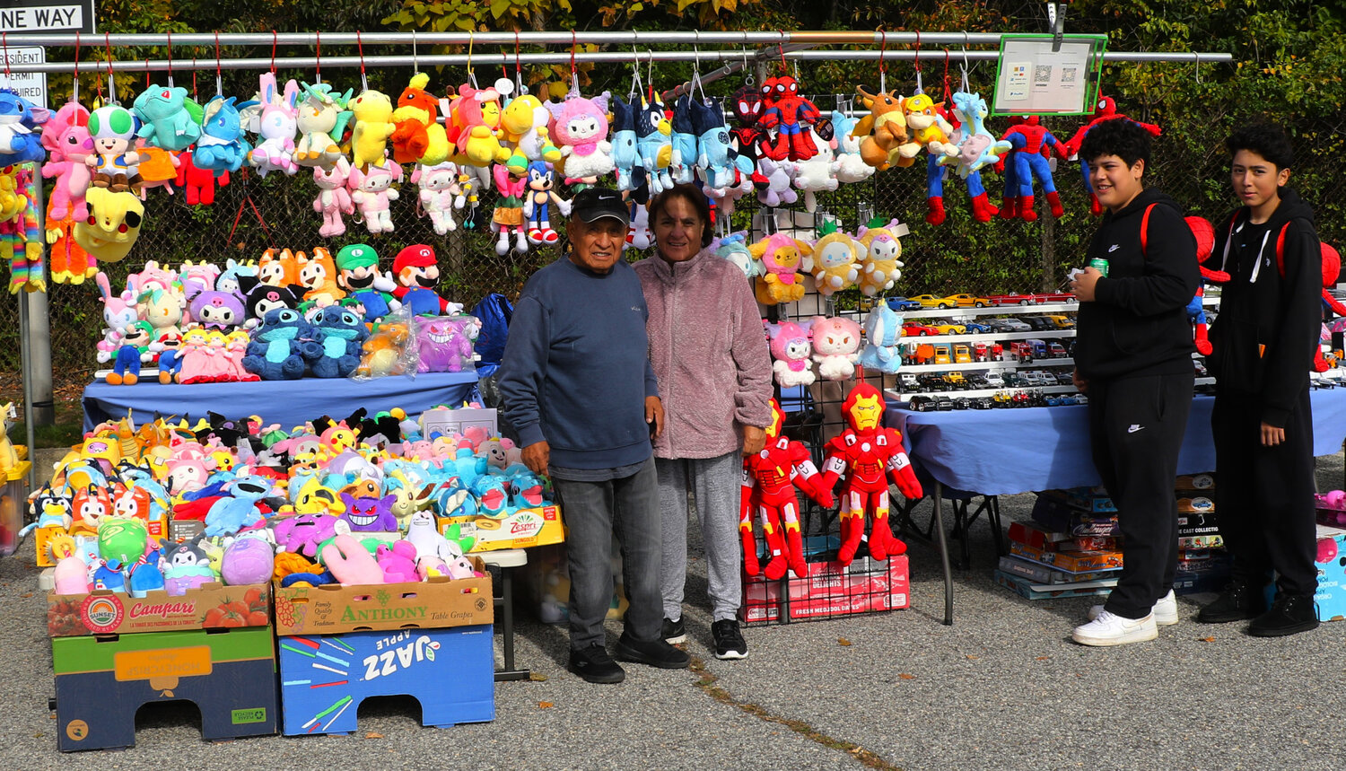 Rudy and Wilma Han from Lola & Toby Toys had many colorful toys for sale.  Carlos Bonilla and Rodrigo Galdamez were interested in the Spiderman items.