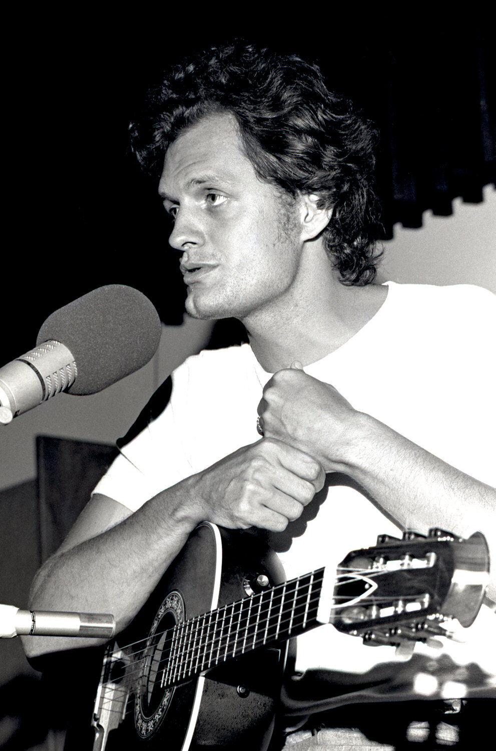 Steve Orlando has taken thousands of professional pictures for big names in the music business, among them this picture of Harry Chapin. But he said the assignments closest to his heart are the ones where he creates memories for people. He’s been photographing