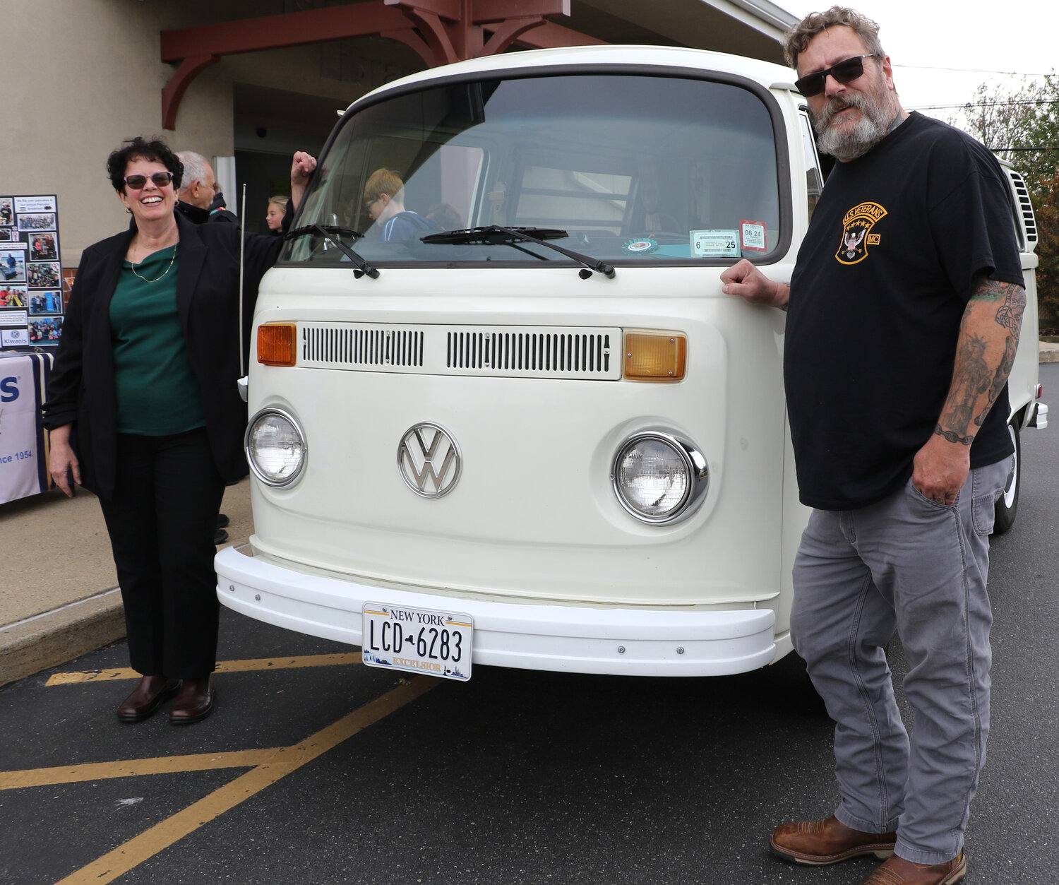 Jessica Koenig, Executive Director of IP Library with Frank Woehling admired the 73’ Volkswagon Bus.
