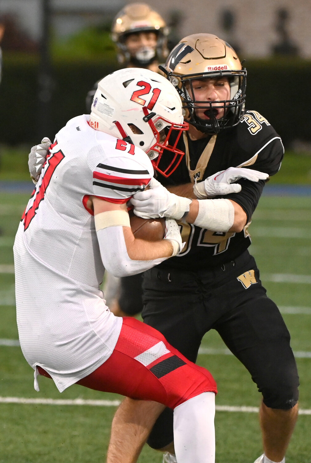 Wantagh’s John Gendels, right, had a grip on Floral Park’s Chase McLoughlin during last Friday’s Conference III semifinal matchup.