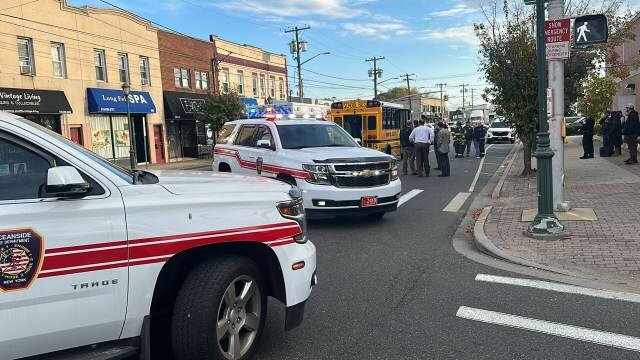 A woman and child were pinned underneath a bus Monday afternoon in Oceanside.