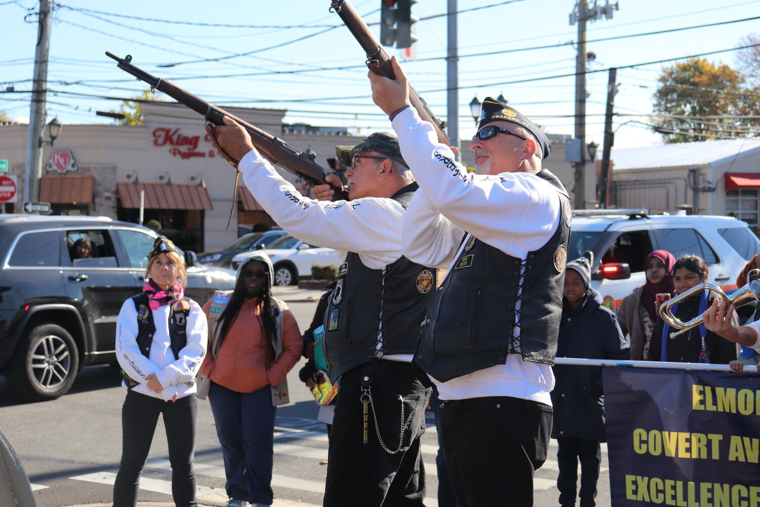 Pete Busch and Kevin Tirman fired the honorary rifle volley at the end of the ceremony hosted on Veterans Day last weekend in Elmont.