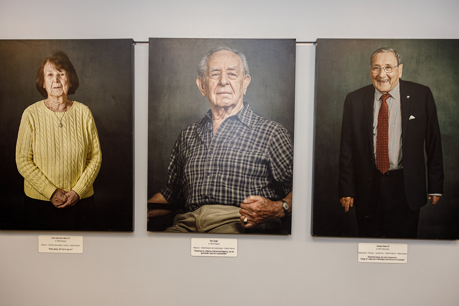The exhibit was coordinated by Dinah Kramer, whose mother, Sara Gole, left, is included in it. Her photo is displayed alongside those of Ron Unger and Werner Reich.