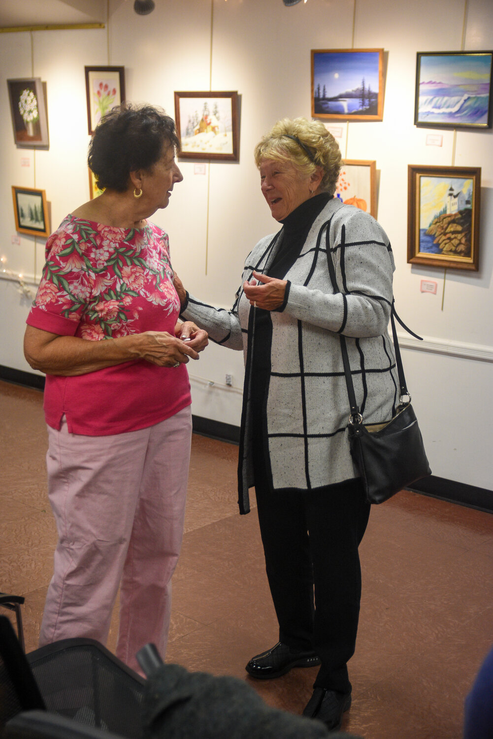 Zanetto and Pat Southard chat at the reception of her show. The display opened earlier this month.