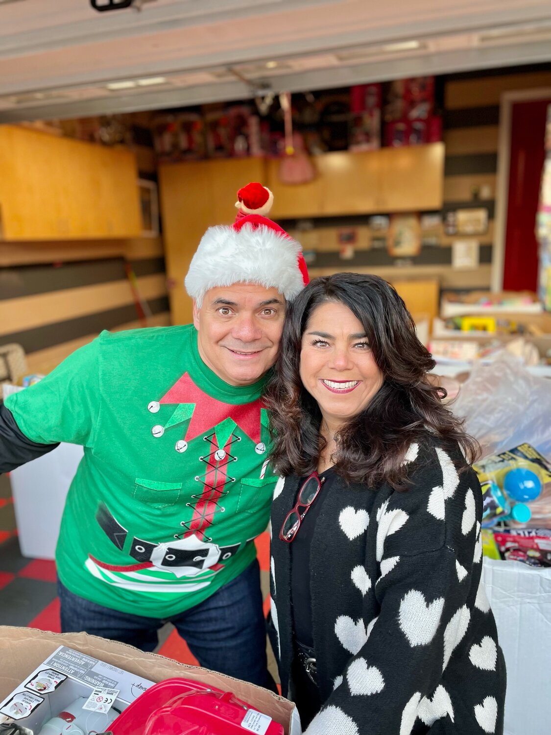 Joe Gallart, left, with his wife, Gina Bennicasa, has been collecting toys for Toys for Tots since 2016. This year, his efforts are the same, but in memory of his daughter, under the name ‘Desirae’s Darlings.’