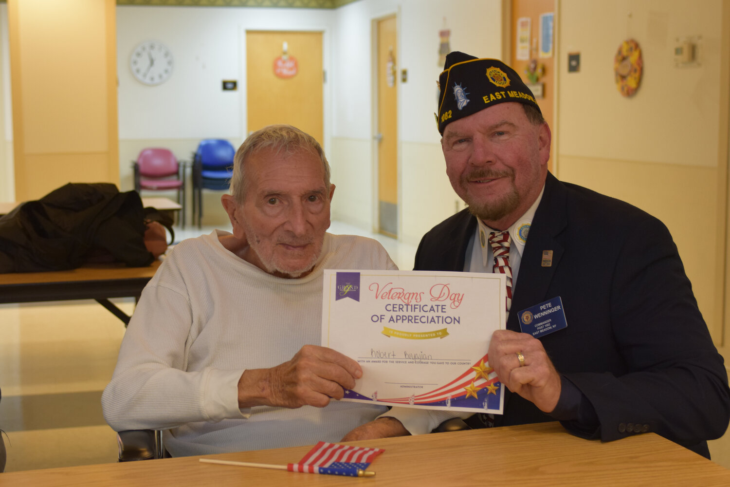 At Fulton Commons Care Center on Merrick Avenue in East Meadow, Pete Wenninger, right, of the American Legion thanked fellow veteran Robert Boyajian.