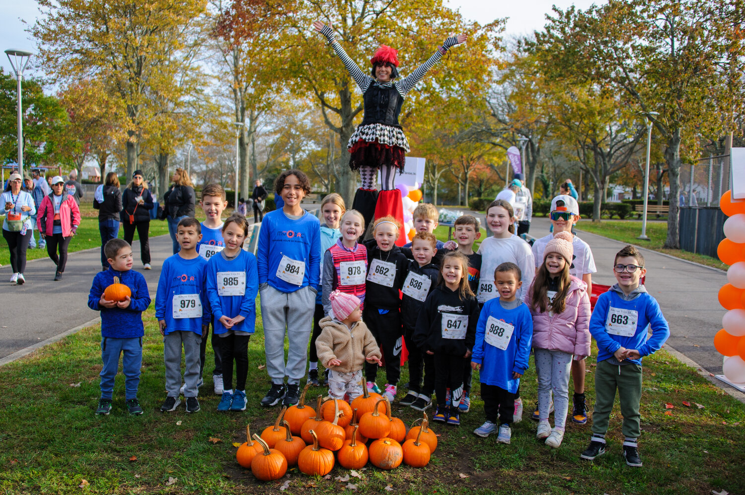 Children picking pumpkins after running in the Pumpkin Fun Run on Nov. 4 at Baldwin Harbor Park. The run occurred before the Marriane Volpe 5k.
