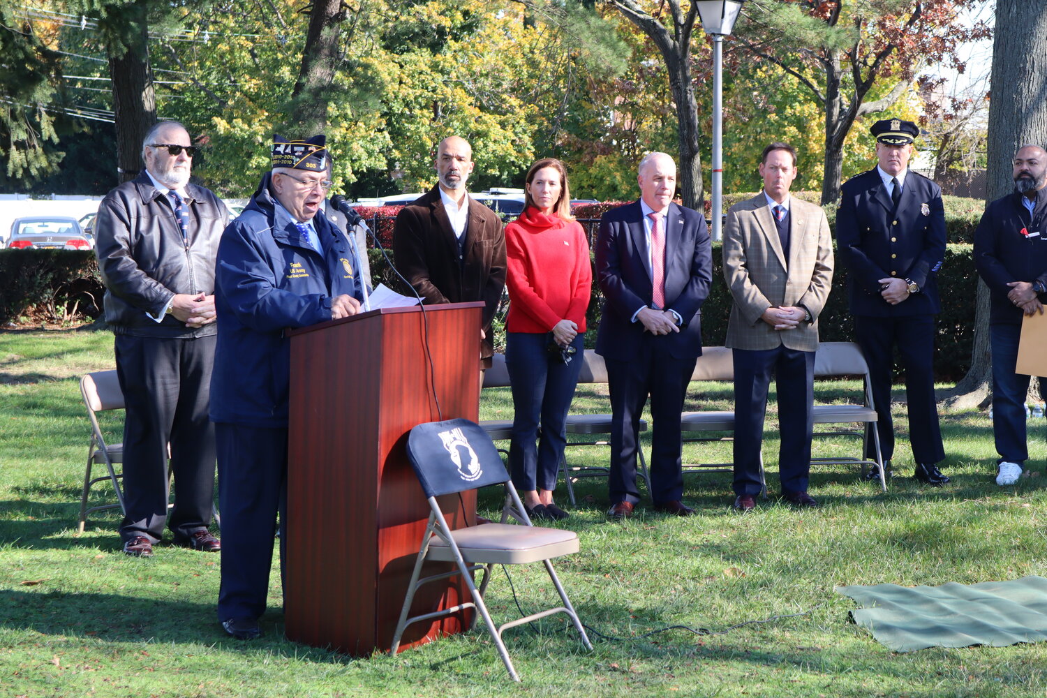 American Legion Post 303 Commander Frank Colón Jr. speaks about Veterans Day and the importance of taking action to ensure veterans’ well-being. He is joined by Rockville Centre Mayor Francis Murray, Assemblyman Brian Curran, Nassau County Legislator-elect Scott Davis, Village Trustees Katie Conlon, Emilio Grillo, Gregory Shaughnessy and RVC Police Commissioner Randy Dodd.