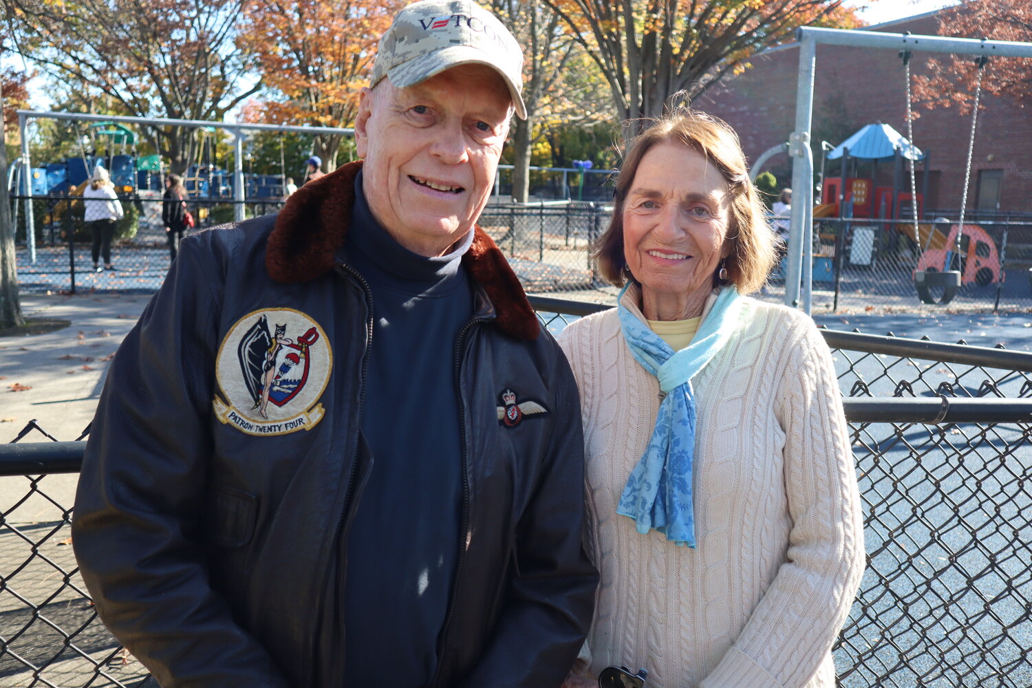 U.S. Navy veteran Greg Rinn, left, and his wife, Jane, share details on his years as a pilot in the service.
