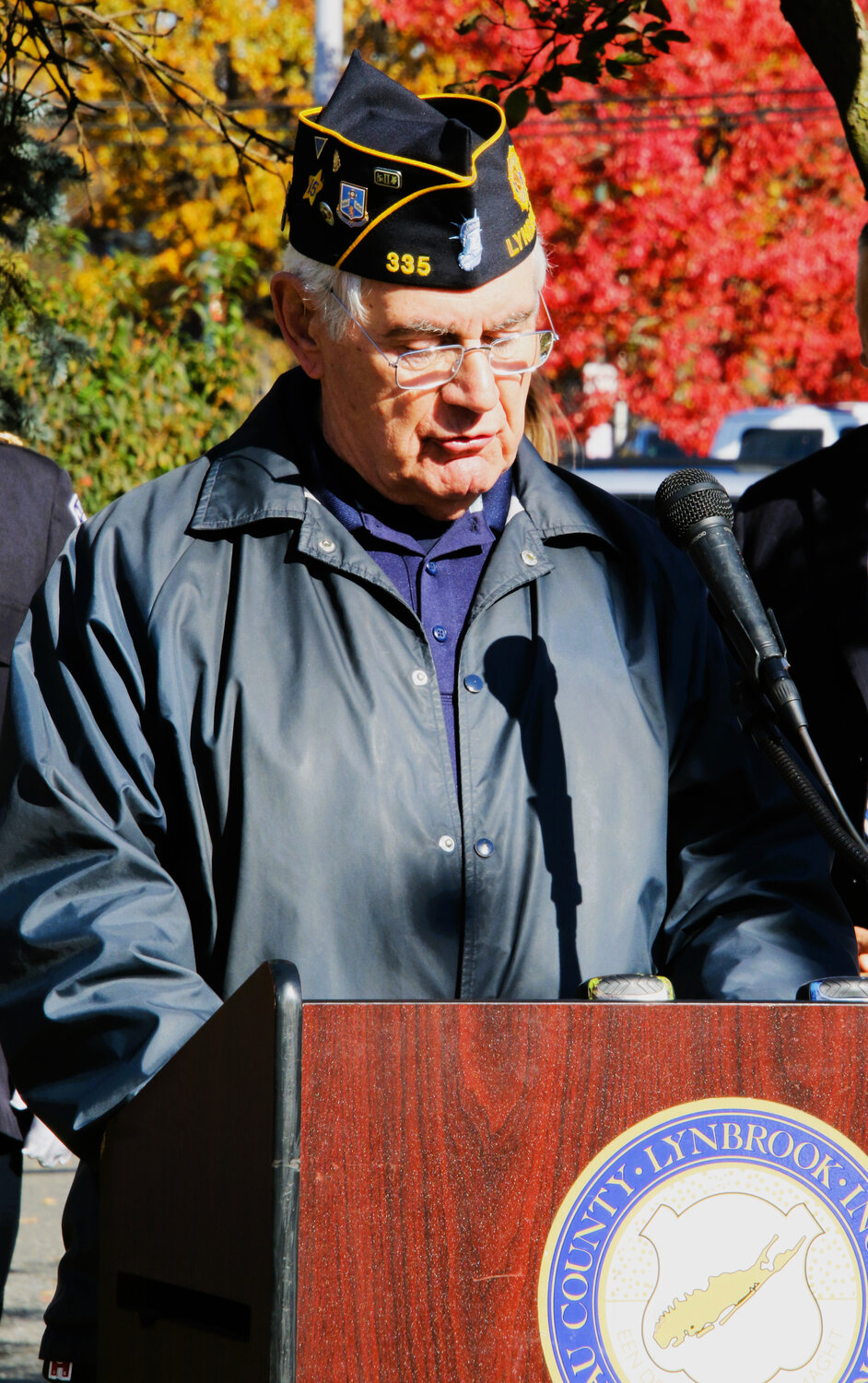 Bill Marinaccio, Commander of Lynbrook's American Legion Post 335, addresses neighbors gathered to honor veterans