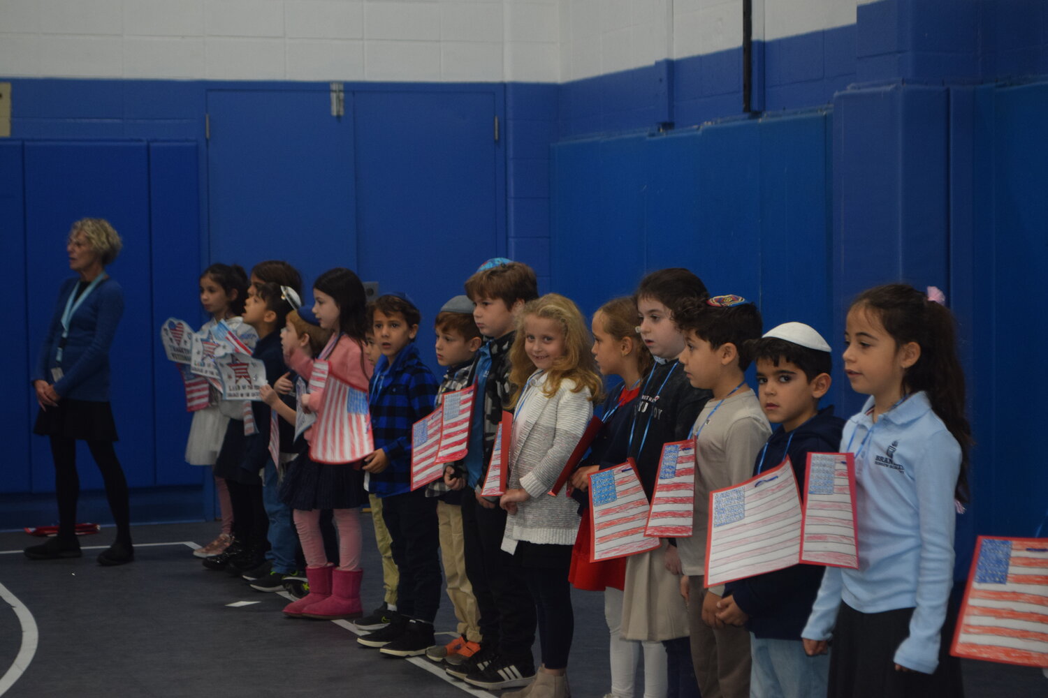 The Veterans Day program at Brandeis Hebrew Academy included the students singing patriotic songs and reciting the Pledge of Allegiance in honor of all the soldiers.