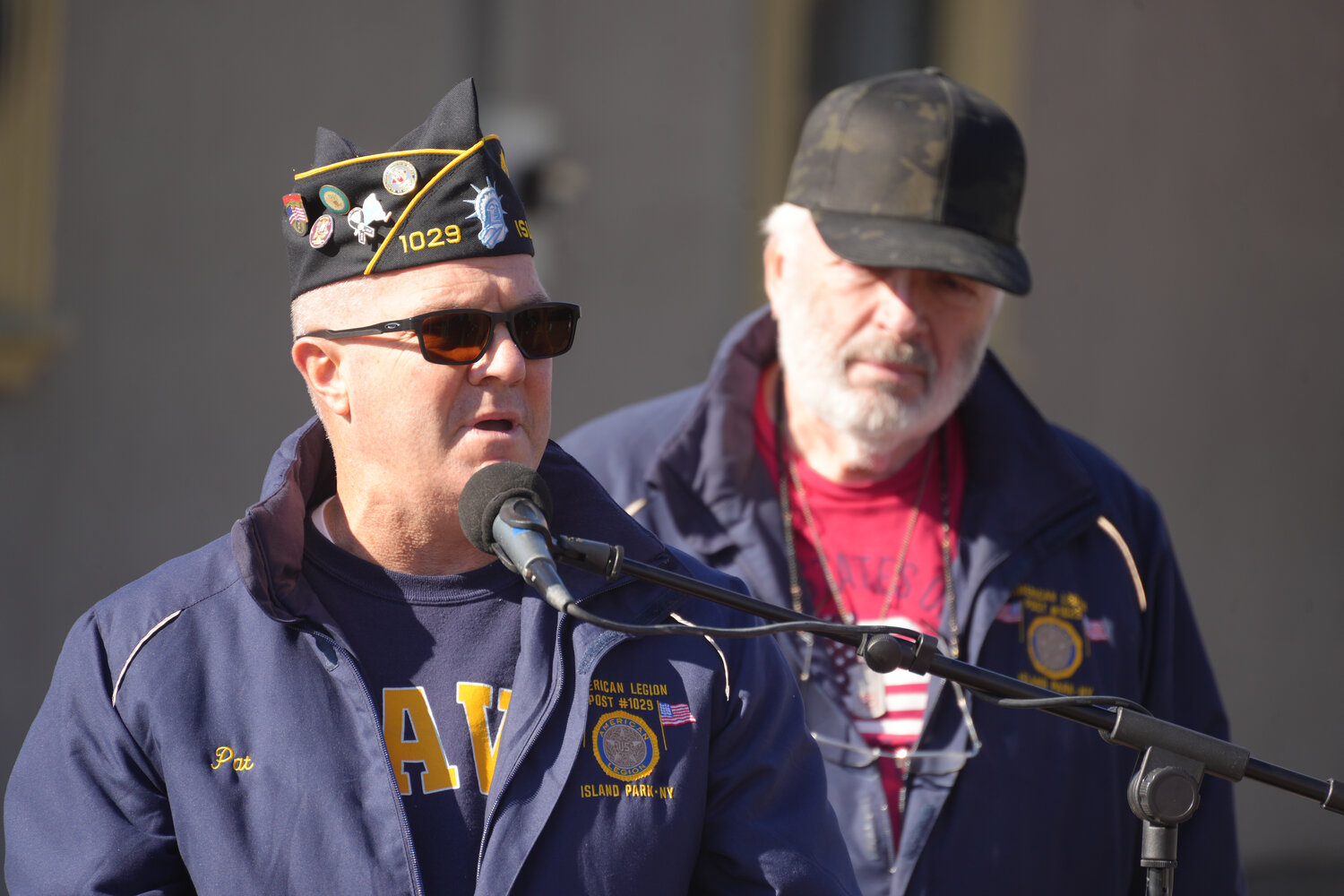 Pat Martin, Commander of American Legion Post 1029 spoke at the Veterans Memorial in Island Park.