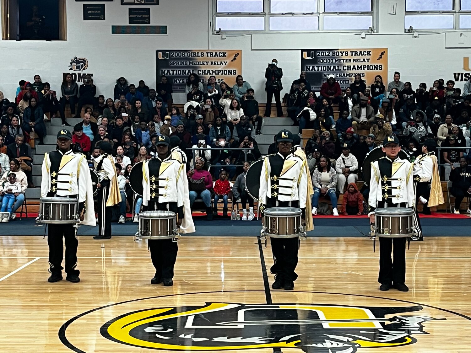 Members of Pure Gold, Uniondale High School’s marching band, preparing to perform at Sunday’s second annual Percussion Night.