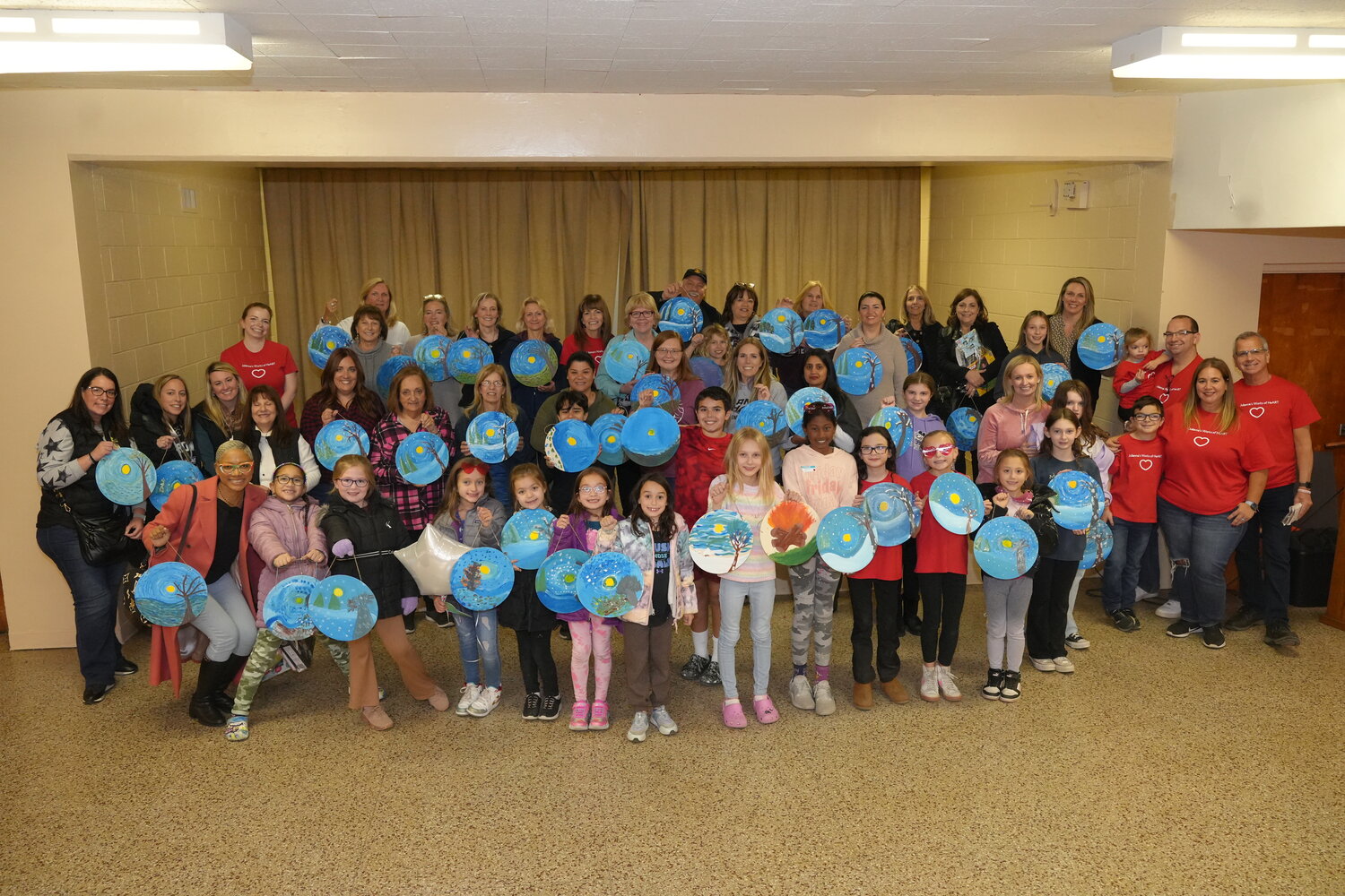 Julianna’s Works of HEART’s paint night was well attended, and raised over $7,000. It was held at the Sacred Heart Roman Catholic Church.