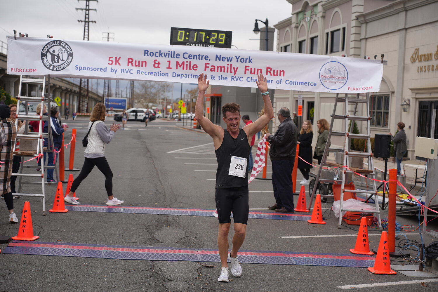 David Putterman, 41, of Rockville Centre finishes the annual 5k race in first-place for the second year-in-a-row with a final time of 17 minutes and 27 seconds.