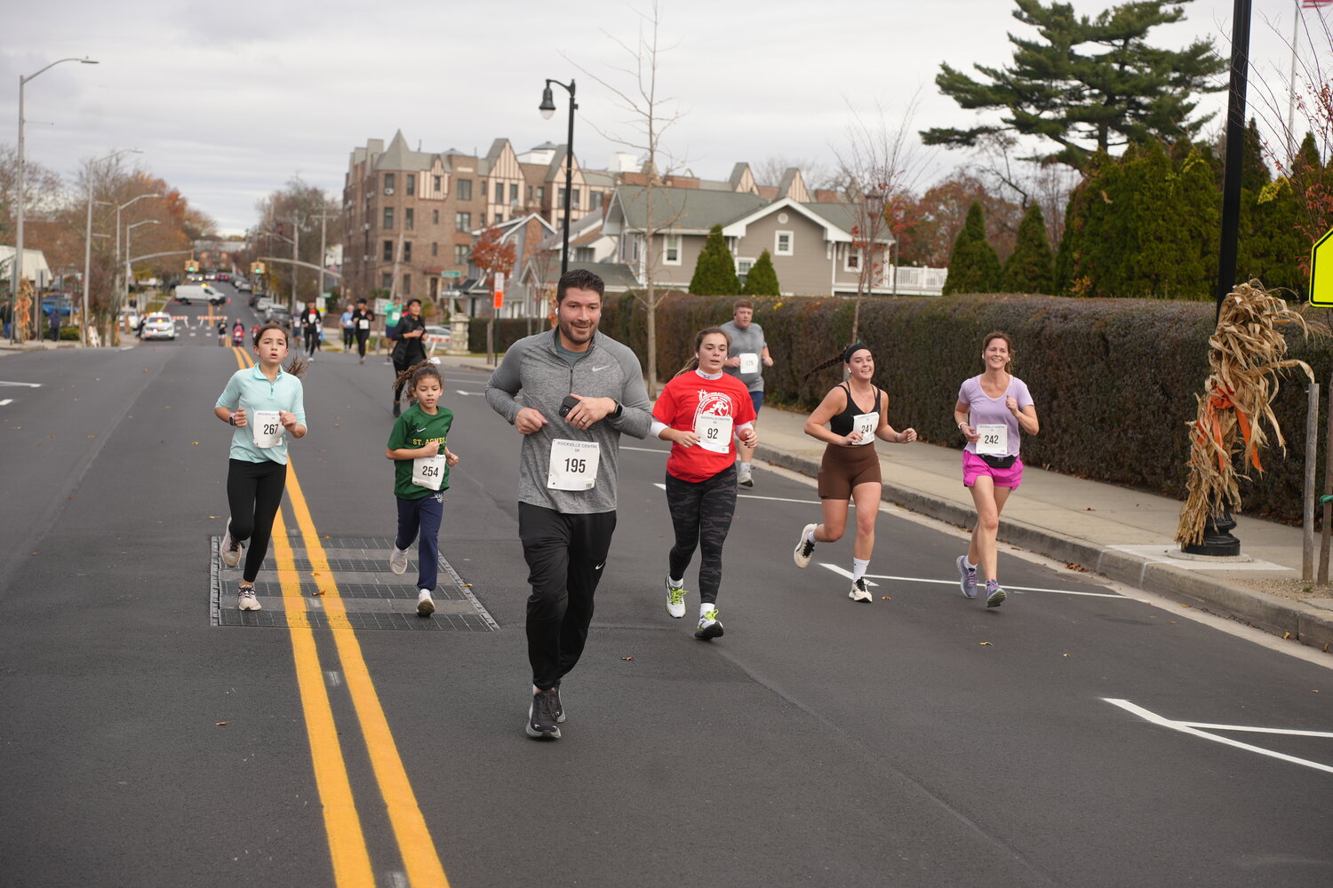 Runners continued down North Village Avenue towards the finish line on Front Street.