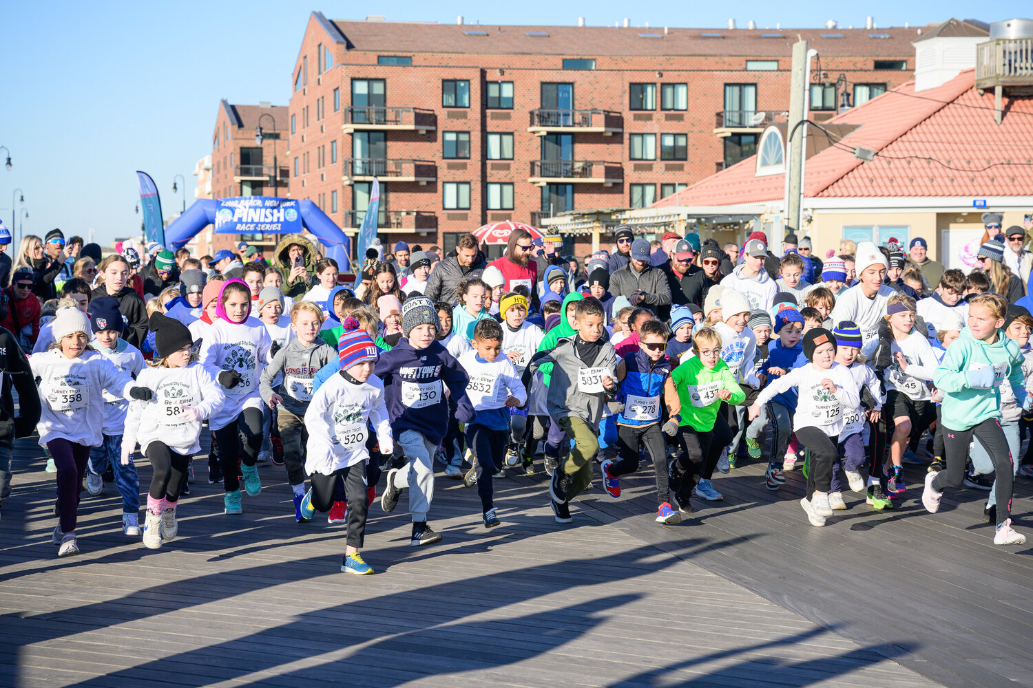 The children’s race took off first Sunday, drawing a large number of young marathoners.