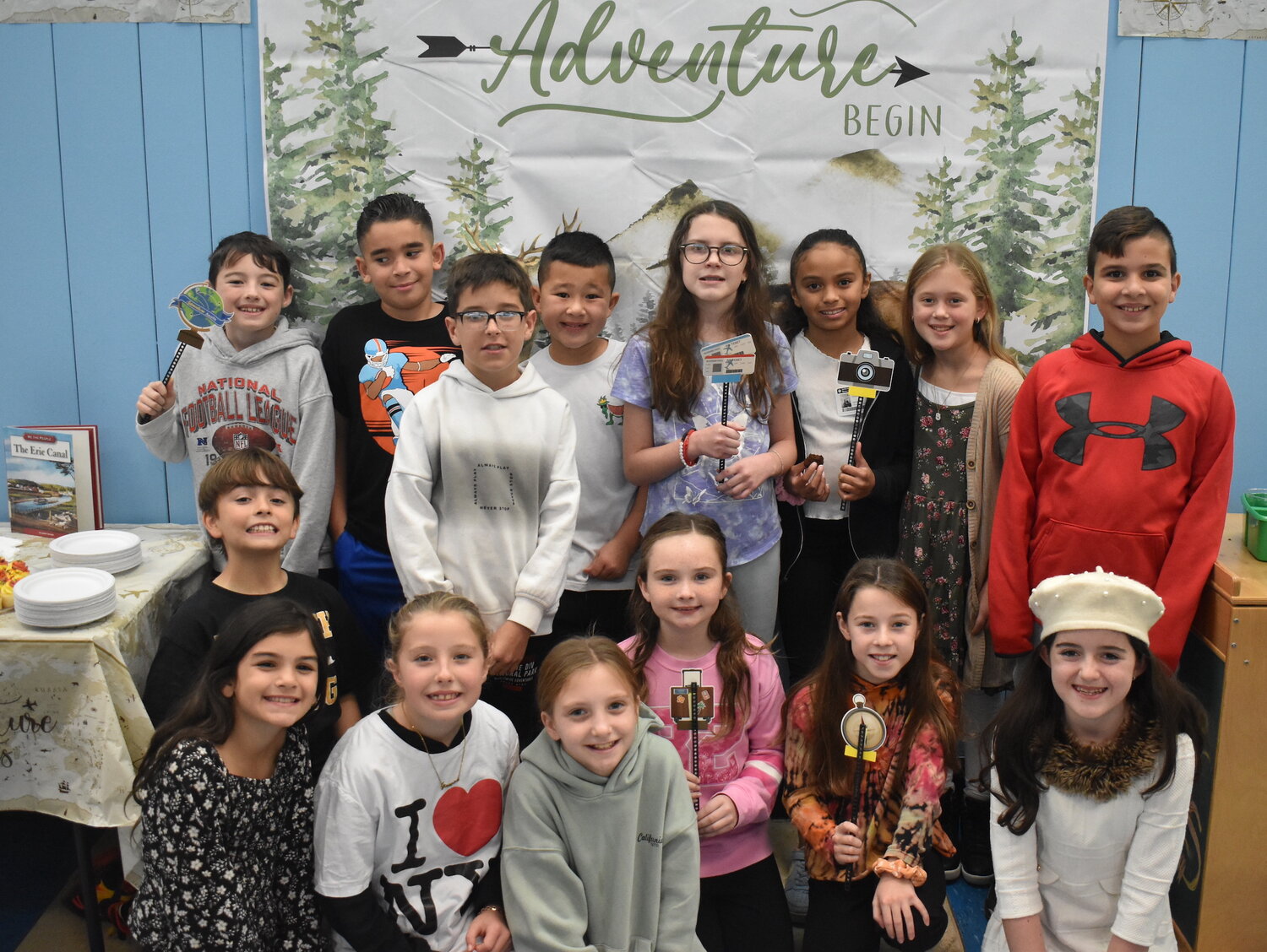 Mandalay Elementary School fourth graders celebrated the completion of their digital New York State region presentations on Nov. 14 with its first Travel Agency Day, which included a photo station.