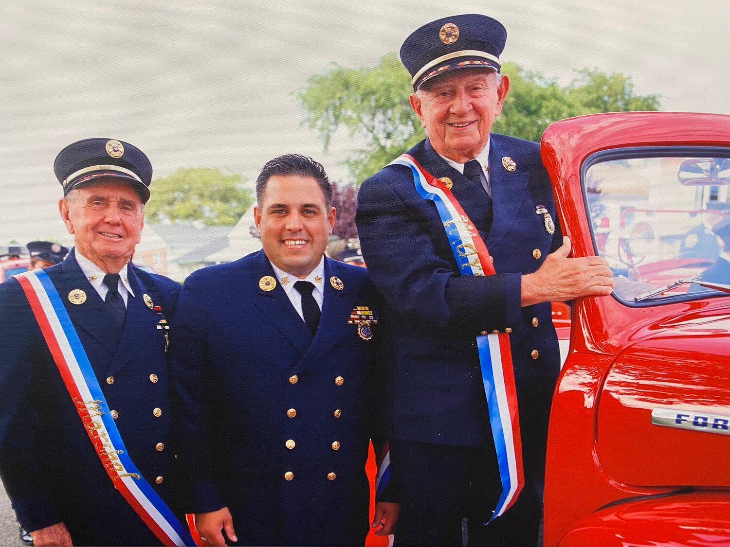 Francis ‘Red’ McGann, far left, U.S. Rep. Anthony D’Esposito and Edward ‘Doc’ McGann at this year’s Memorial Day Parade in Island Park.