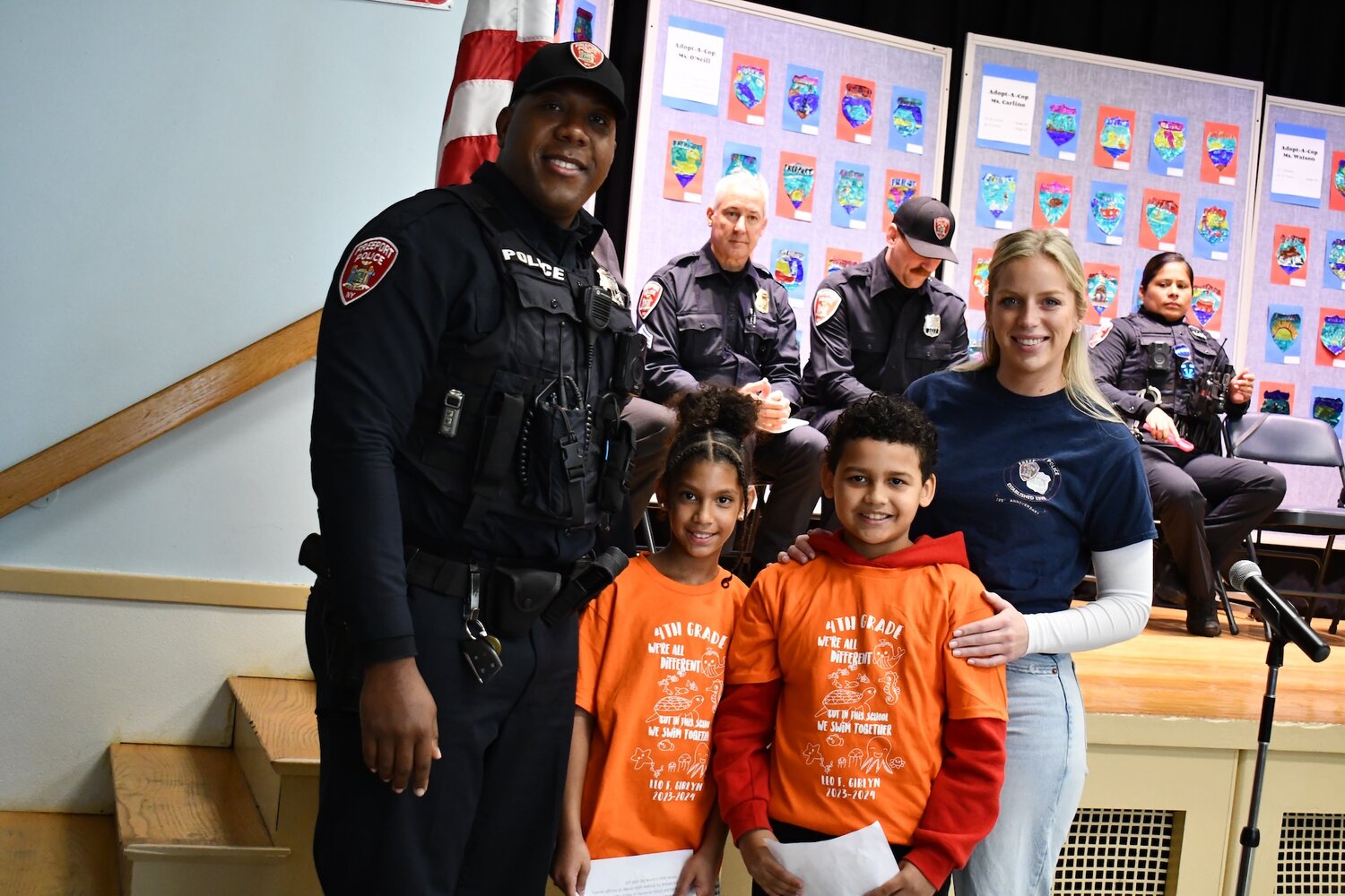 Giblyn fourth-graders Kylie and Matthew introduced their adopted cops from the Freeport Police Department, Lt. Edward Thompson and Officer Kaitlyn Karp.