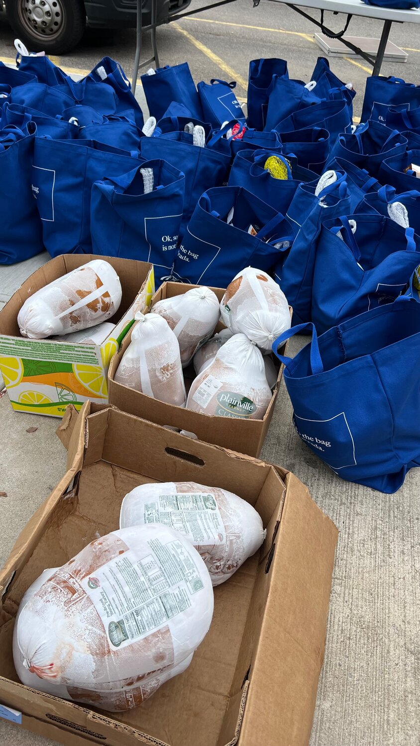 The North Shore Hispanic Chamber of Commerce donated many turkeys to the community.