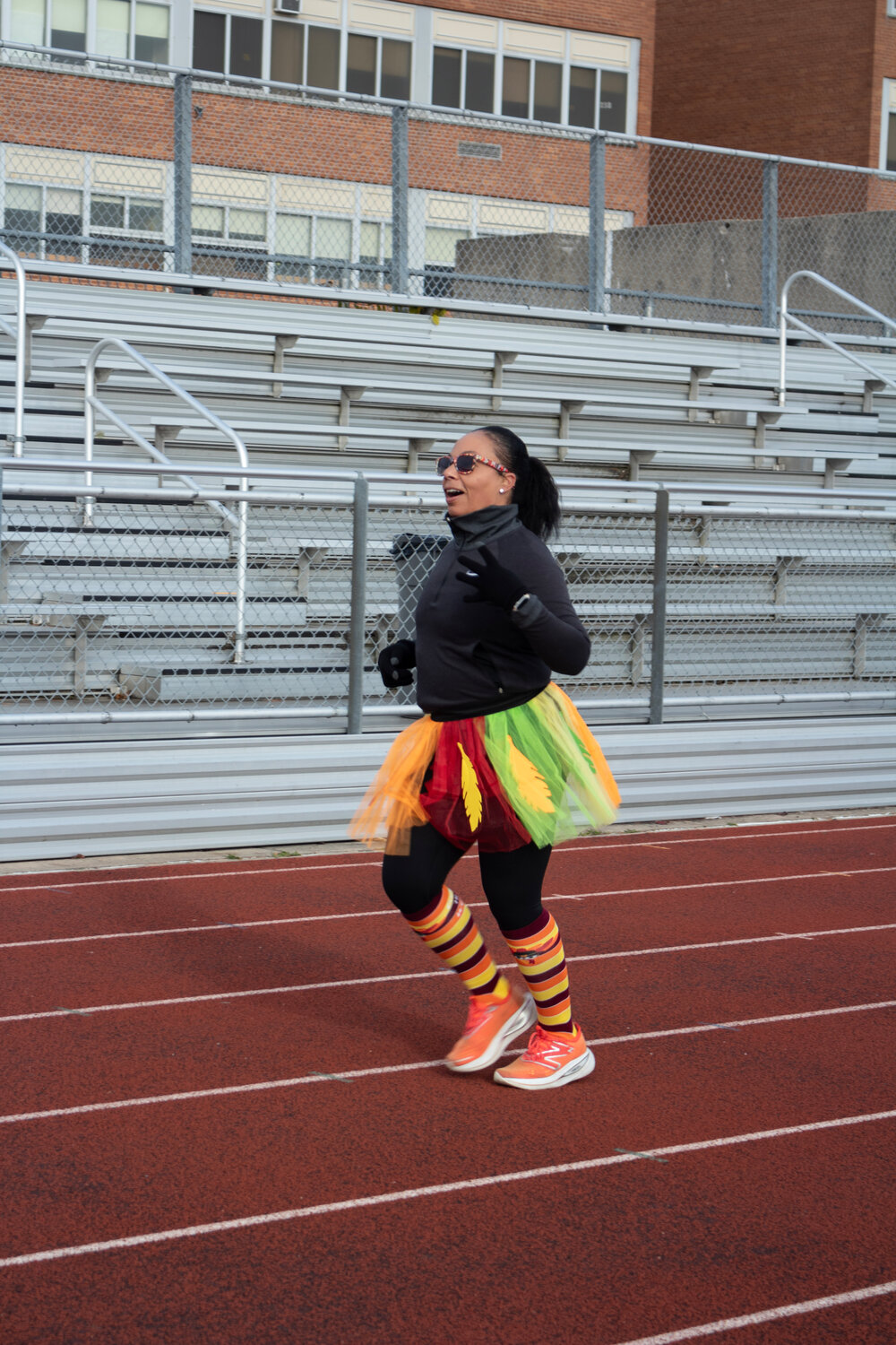 Deborah Prince dressed up in a tutu reminiscent of turkey feathers as she finished her fourth lap at the Elmont Memorial High School track last Sunday.