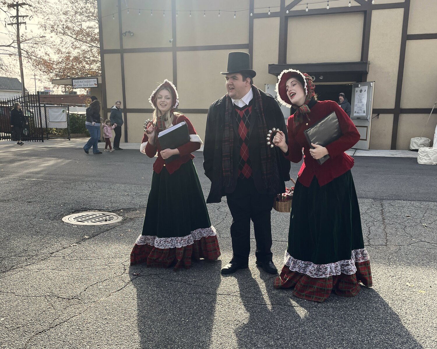 Carolers greeted those who attended the Christkindl Markt, reminiscent of European Christmas markets, at Plattduetsche Park, Restaurant, Catering and Biergarten.