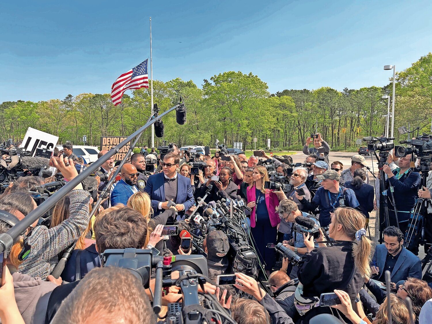 Congressman George Santos is no stranger to holding news conferences. A mob of reporters asked him questions on May 14 after his first court appearance in Central Islip.
