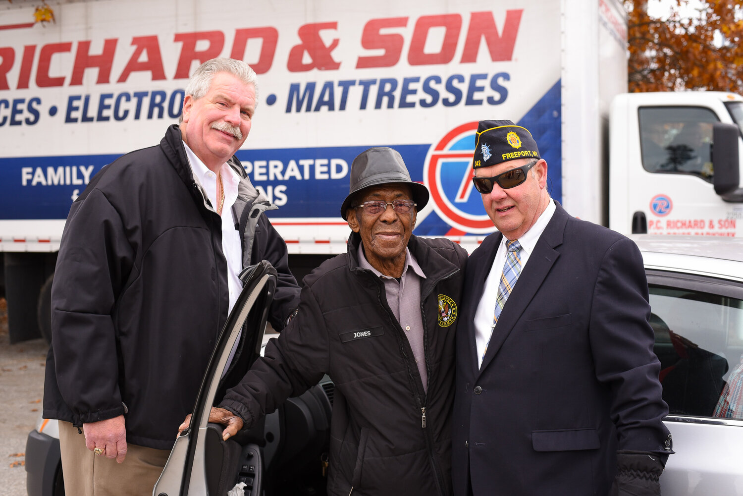Freeport Fire Department executive director Ray Maguire, Korean War Veteran Curley Jones of Freeport and Mayor Robert Kennedy at the Stand Down event.