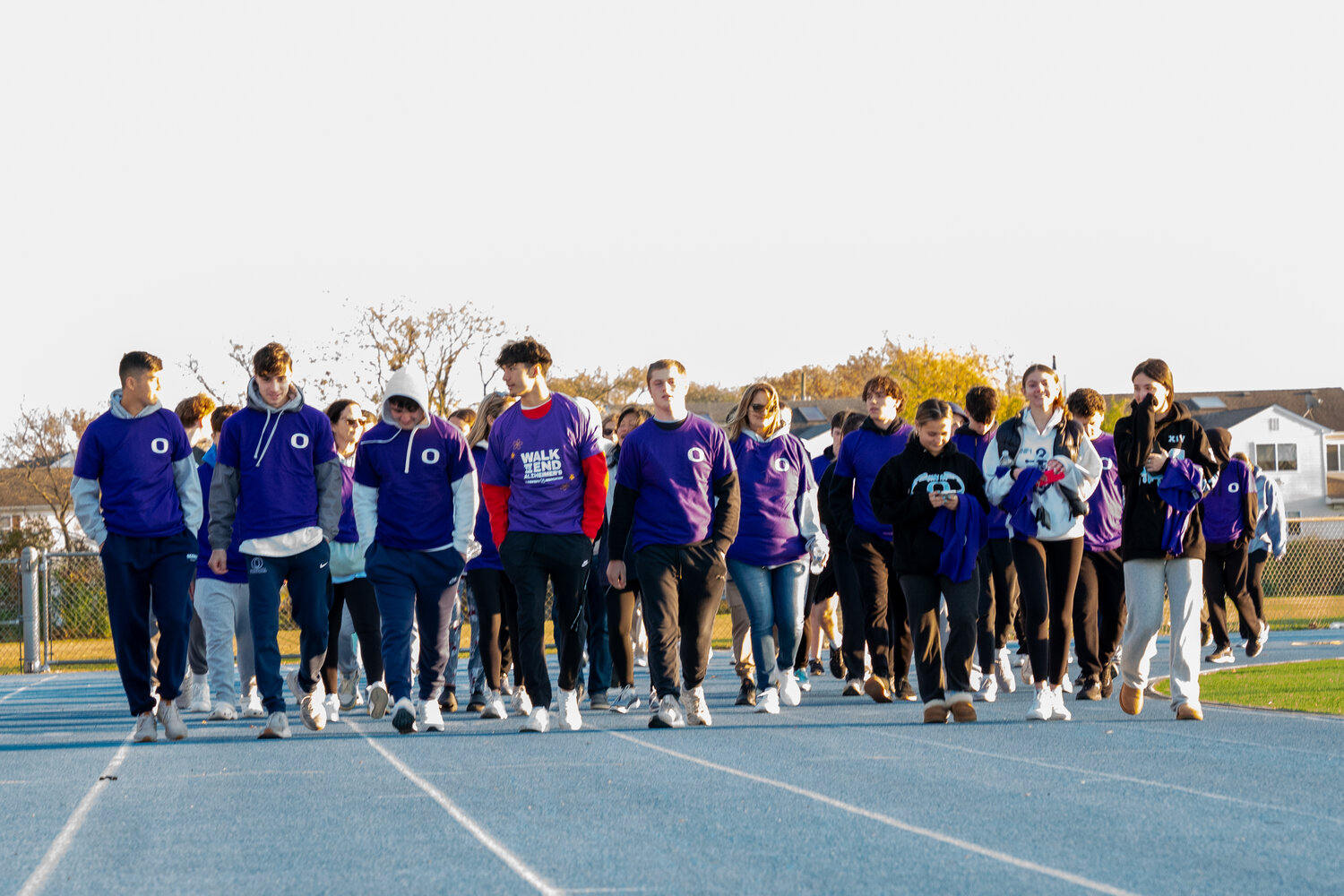 Participants strode around the football field at Oceanside High School’s first Walk to End Alzheimer’s on Nov. 19 to raise awareness of the disorder.