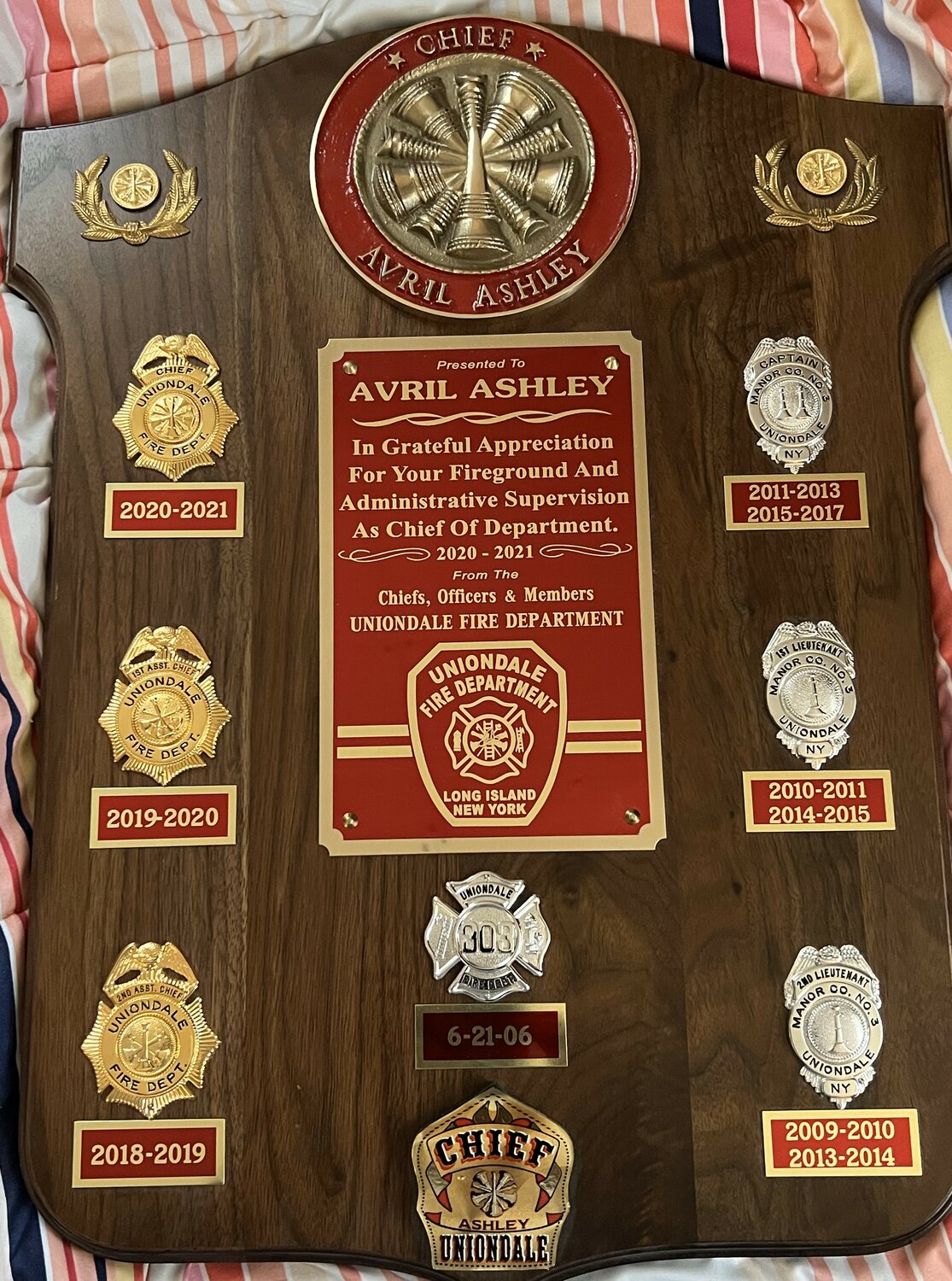 A 2021 plaque of appreciation from the Uniondale Fire Department commended Lt. Avril Ashley for his years of service.