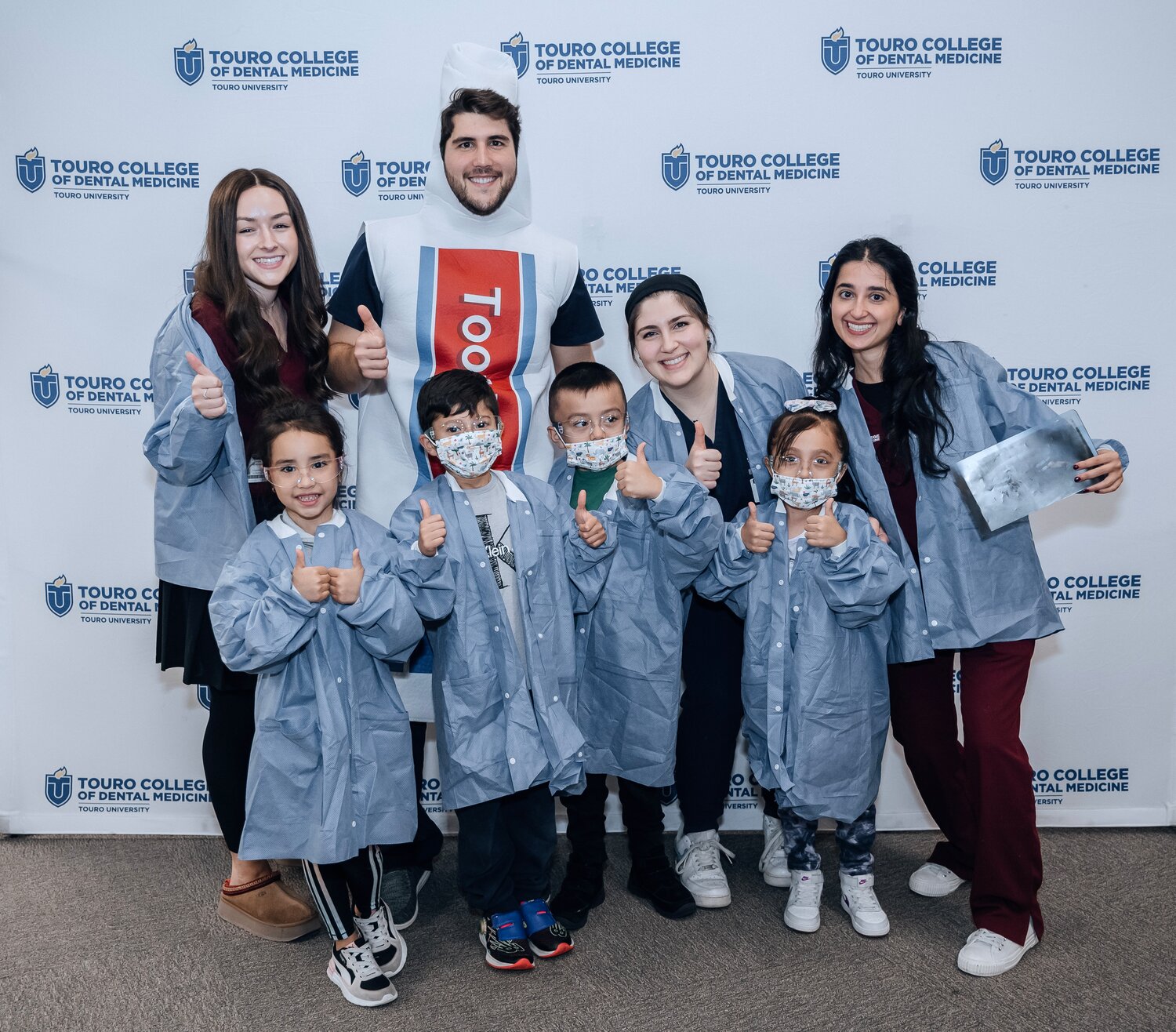 Touro College of Dental Medicine students visited Lawrence kindergarten kids in October. In back from left were Yehudis Friedman, Andrew Polito, Daniela Benzaquen and Shani Levi. In front from left were Victoria Castillo, Caleb Peralta Castro, Angel Cifuentes and Bianca Mazariegos Constanza.