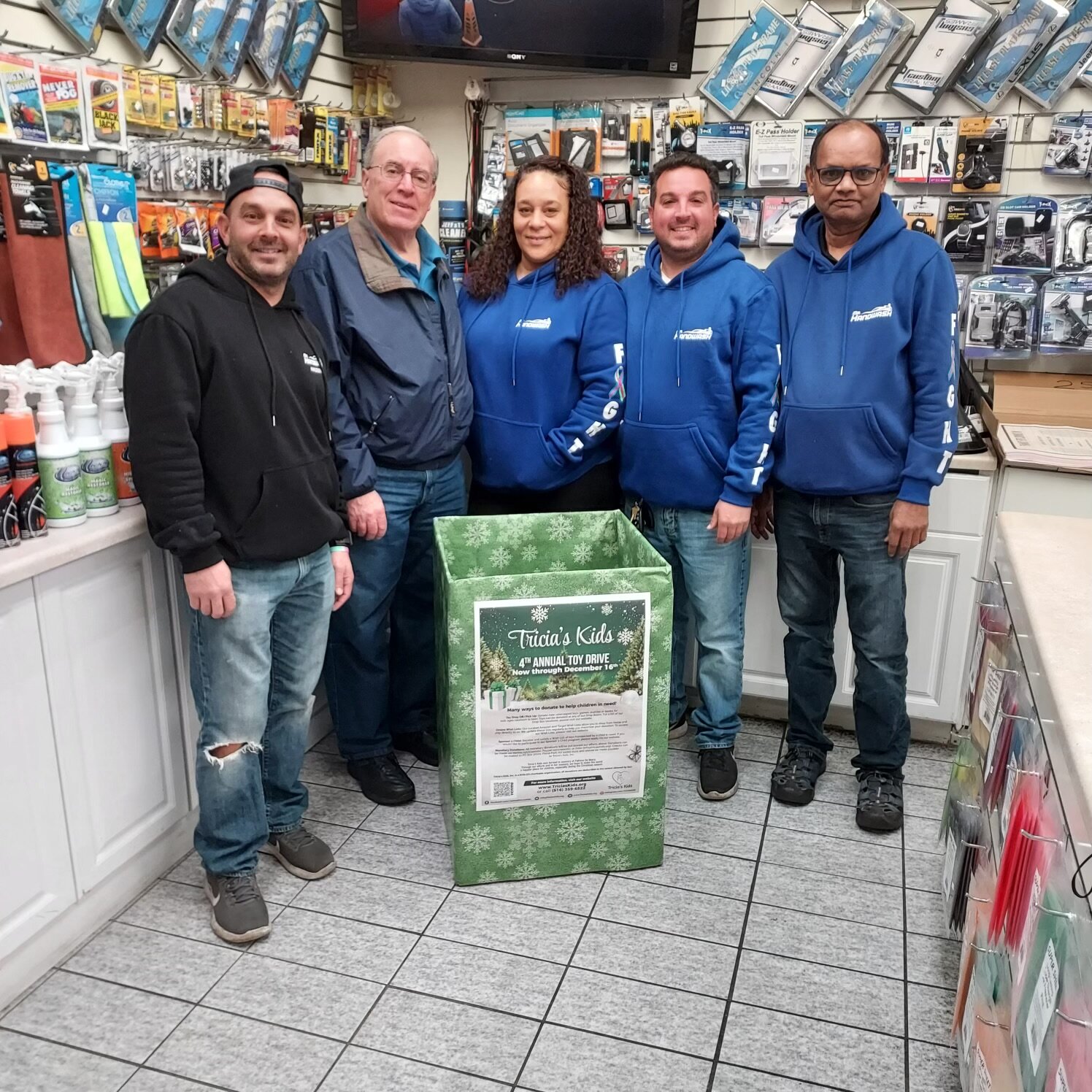 Frank Conte, Thomas DeMaria, Mimi Perullo, Chris Conte and Patel Bipinchandra at Mr. Handwash encourage community members to donate toys for nonprofit Tricia’s Kids this holiday season.