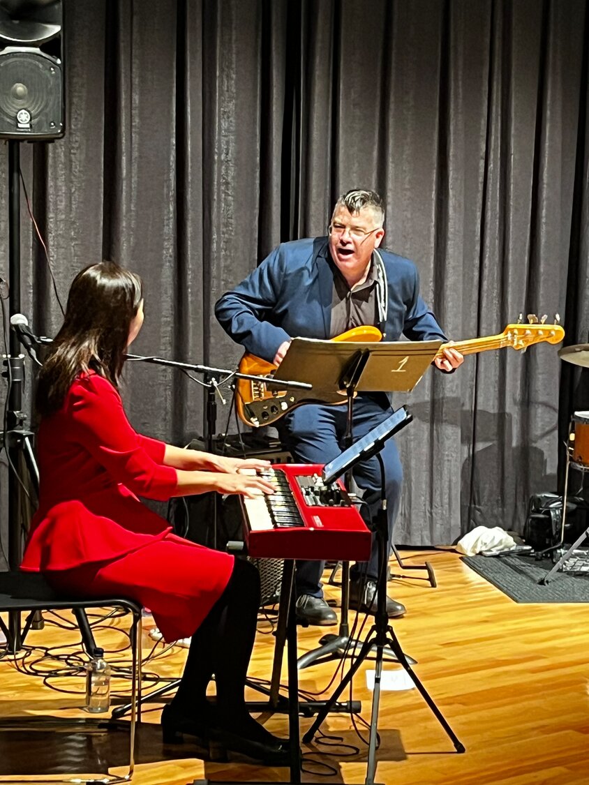 Miho Nobuzane on piano, and Benjamin Willis on bass, rocking out together during the holiday-themed concert at the Uniondale public library this past Sunday.