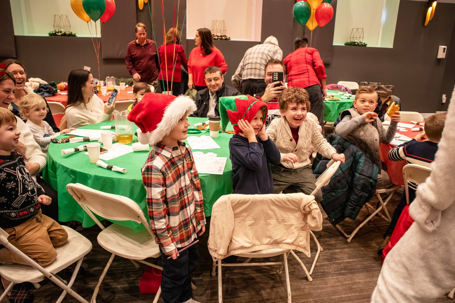 Kids lit up with delight when they finally saw Santa. These little neighbors are sure to be on the Nice List!