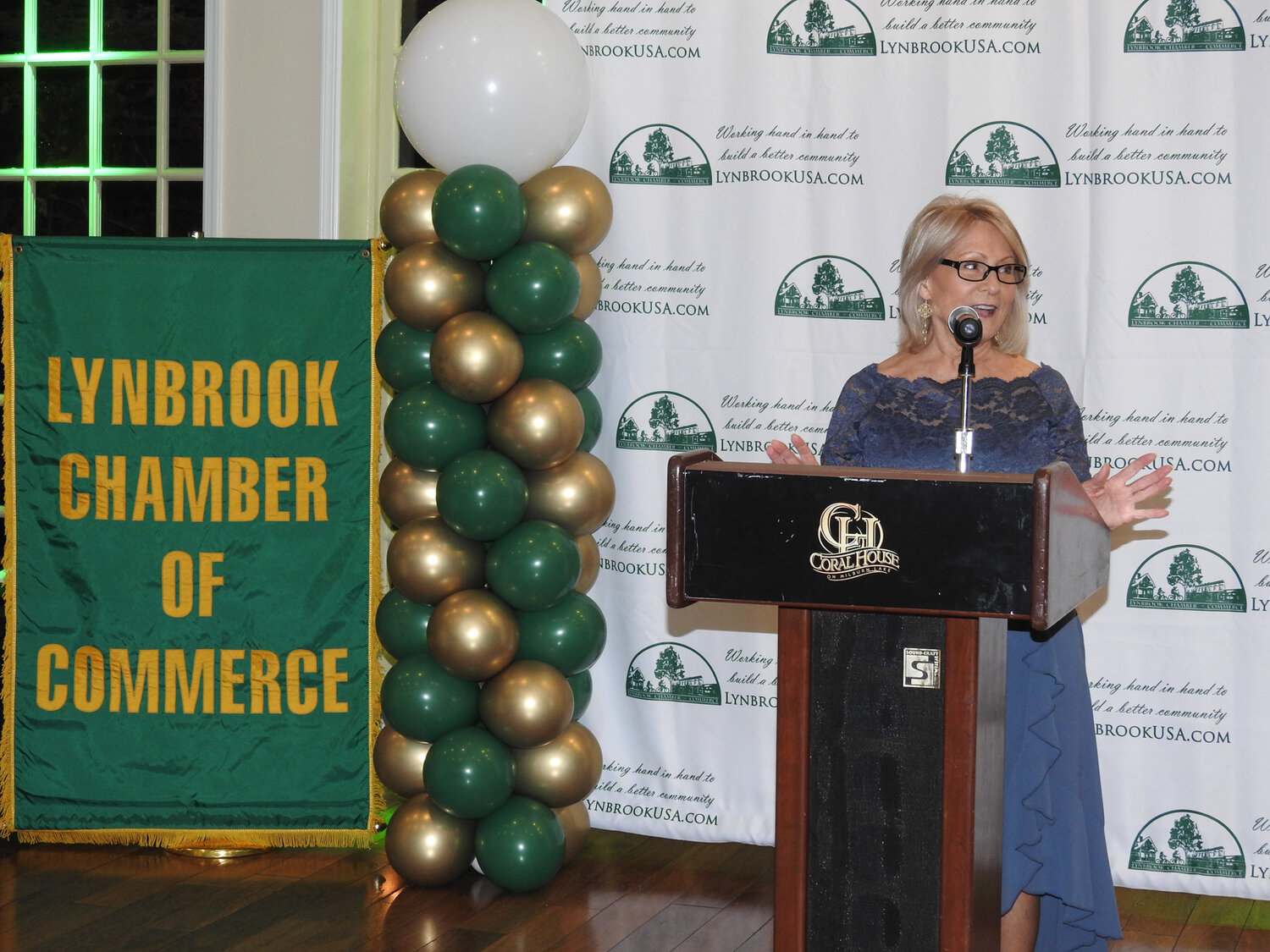 Lynbrook Chamber of Commerce President Polly Talbott speaking at the event.