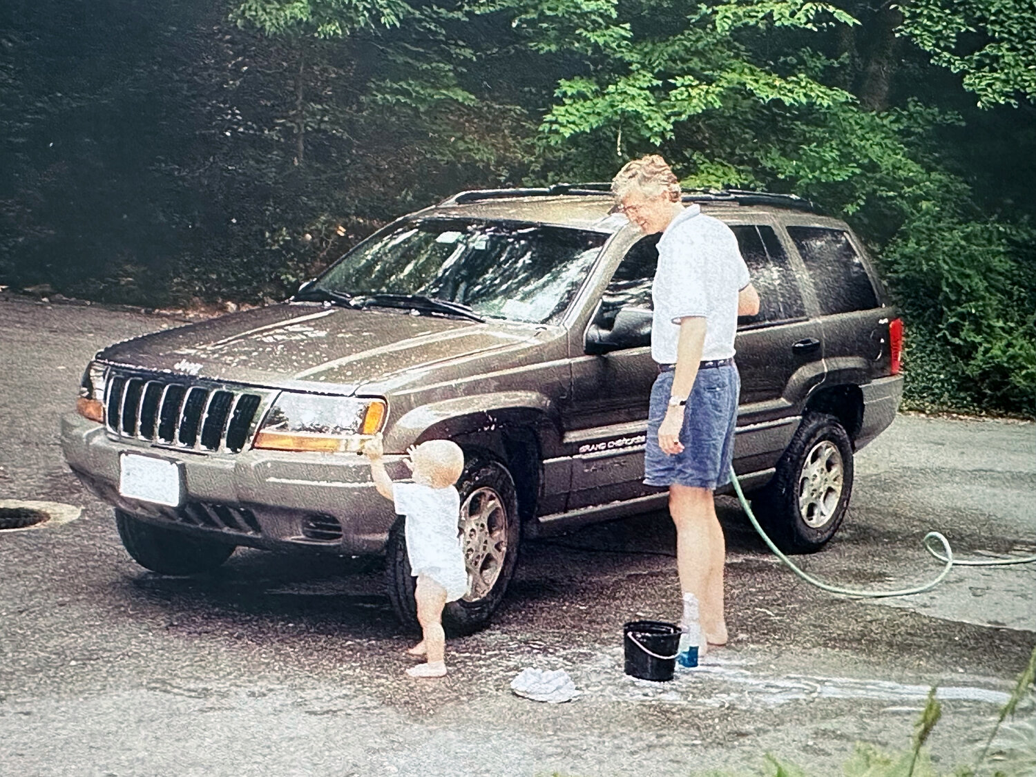 John Niven, who died on Sept. 11, 2001, adored his toddler son, John Jr. He enjoyed involving him in every part of his life, even washing his car on weekends in Oyster Bay.
